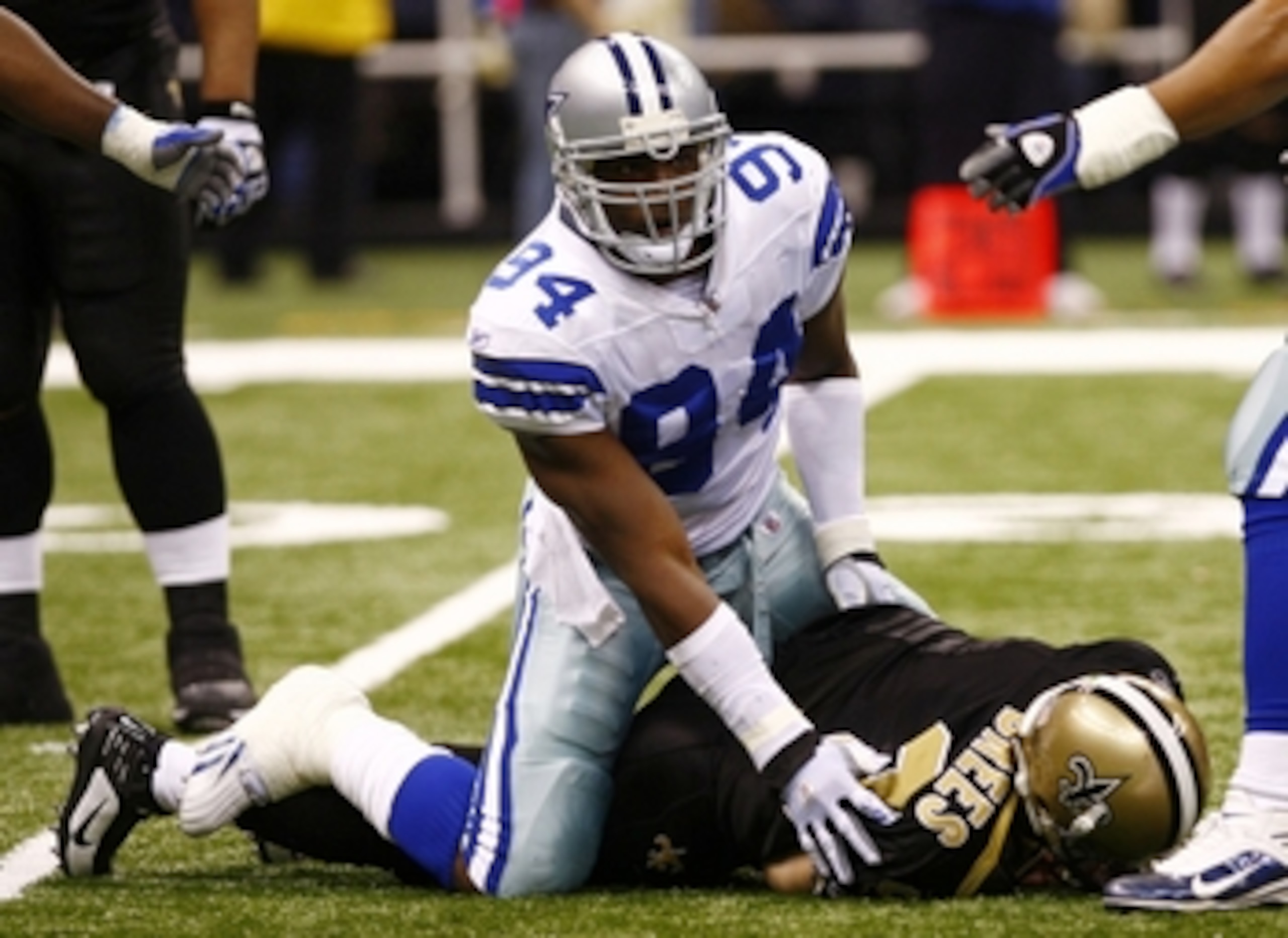 NEW ORLEANS - DECEMBER 19:  Linebacker DeMarcus Ware #94 of the Dallas Cowboys sacks quarterback Drew Brees #9 of the New Orleans Saints at the Louisiana Superdome on December 19, 2009 in New Orleans, Louisiana. (Photo by Scott Halleran/Getty Images)