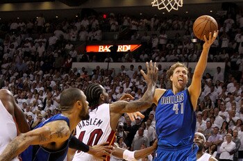 MIAMI, FL - JUNE 02:  Dirk Nowitzki #41 of the Dallas Mavericks makes the game-winning shot to put the Mavericks up 95-93 with 3.6 seconds left in the game against Udonis Haslem #40 of the Miami Heat in Game Two of the 2011 NBA Finals at American Airlines