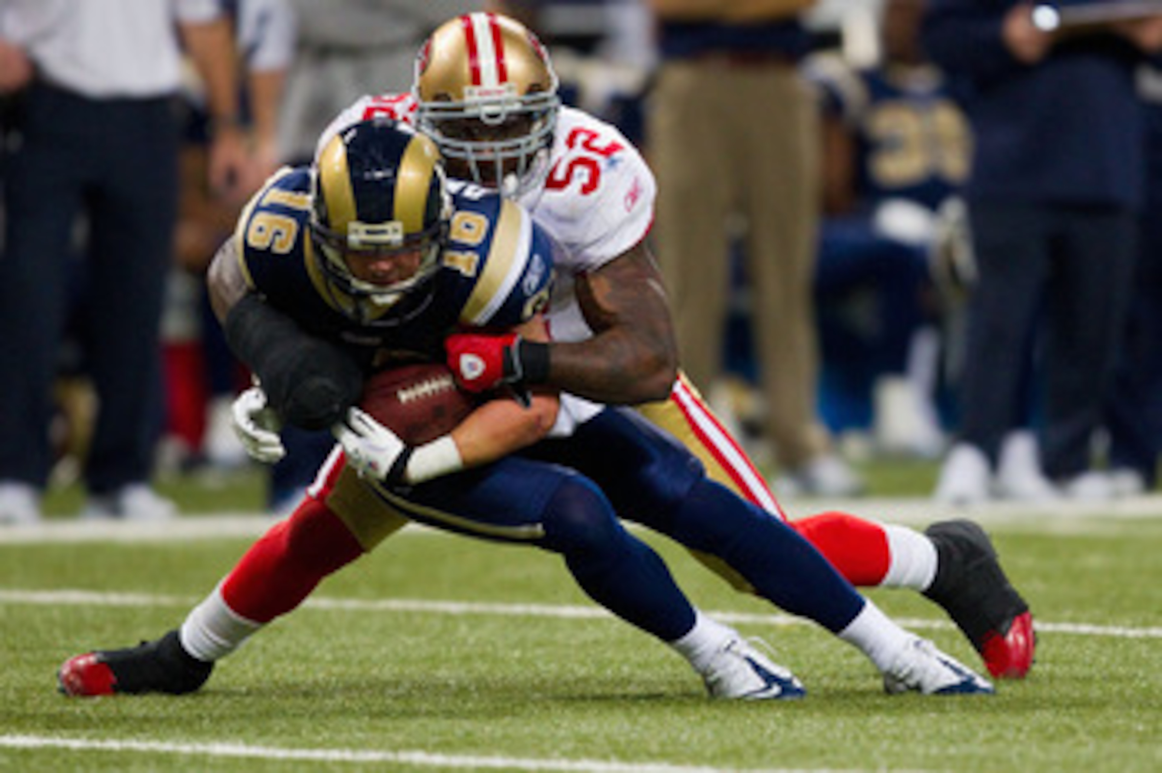 ST. LOUIS, MO - DECEMBER 26: Patrick Willis #52 of the San Francisco 49ers tackles Danny Amendola #16 of the St. Louis Rams at the Edward Jones Dome on December 26, 2010 in St. Louis, Missouri. The Rams beat the 49ers 25-17. (Photo by Dilip Vishwanat/Gett