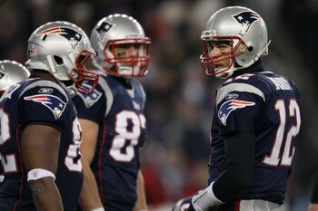 FOXBORO, MA - JANUARY 16:  Quarterback Tom Brady #12 of the New England Patriots stands on the field during their 2011 AFC divisional playoff game against the New York Jets at Gillette Stadium on January 16, 2011 in Foxboro, Massachusetts.  (Photo by Elsa