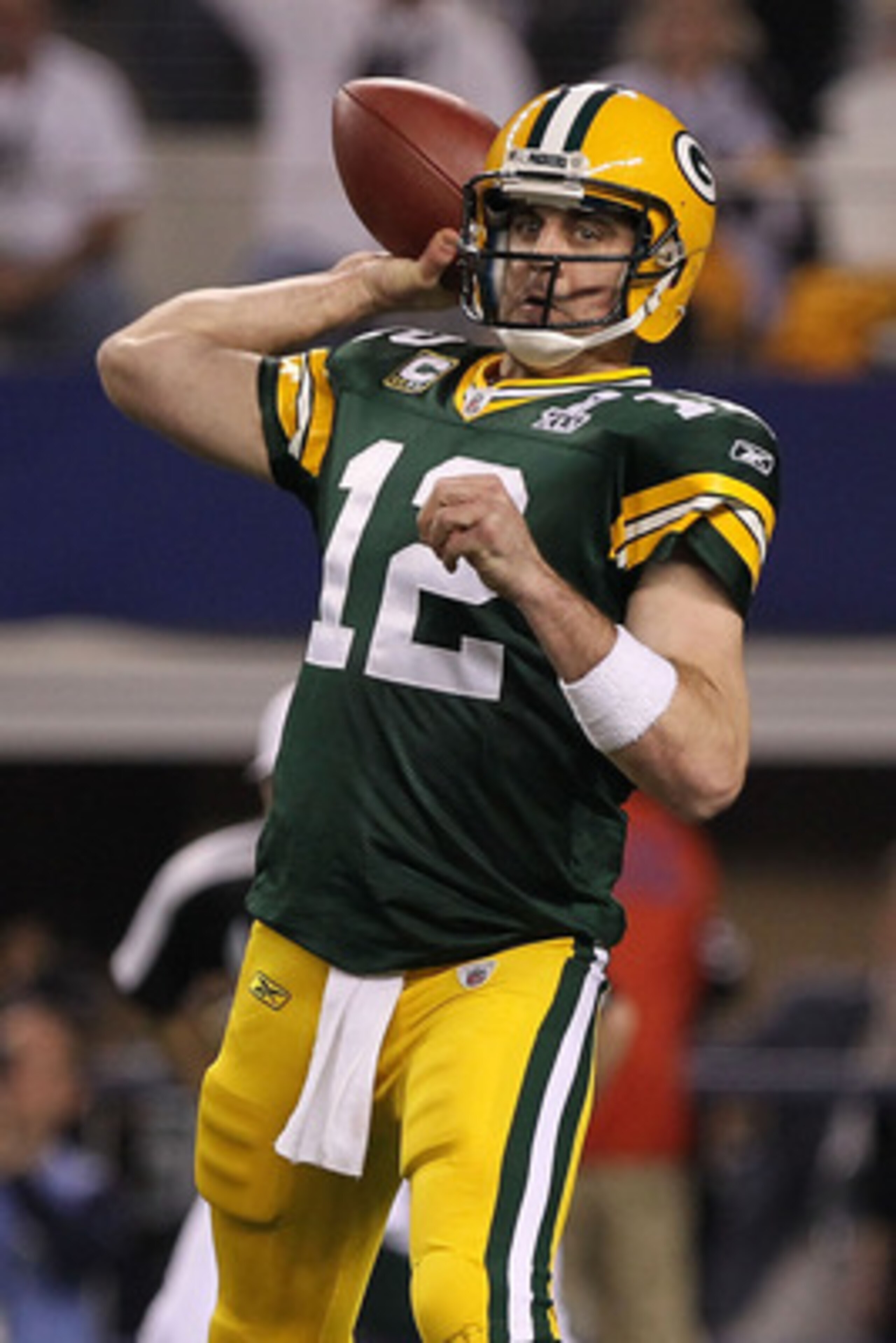 ARLINGTON, TX - FEBRUARY 06:  Quarterback Aaron Rodgers #12 of the Green Bay Packers throws the ball against the Pittsburgh Steelers during Super Bowl XLV at Cowboys Stadium on February 6, 2011 in Arlington, Texas.  (Photo by Doug Pensinger/Getty Images)