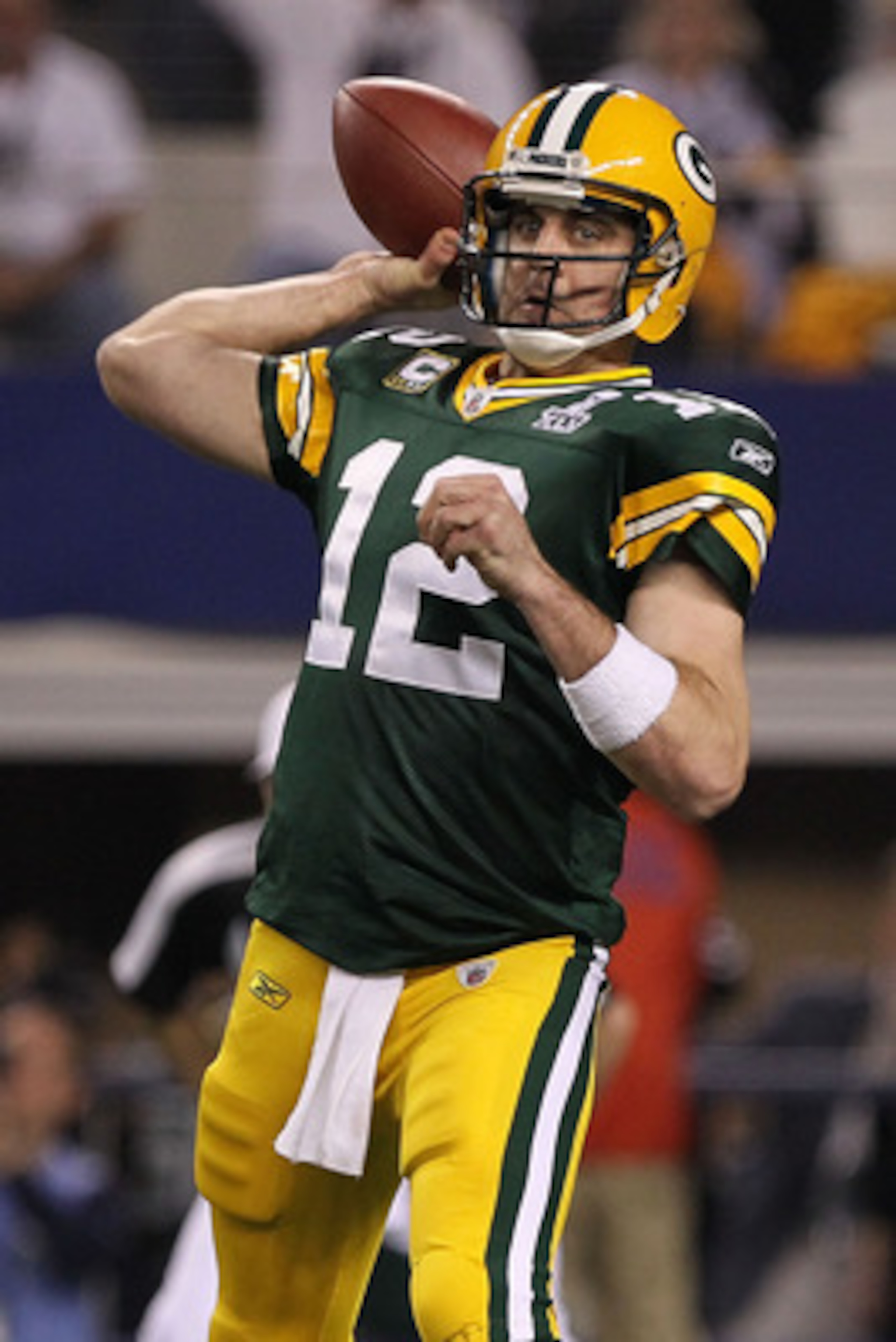 ARLINGTON, TX - FEBRUARY 06:  Quarterback Aaron Rodgers #12 of the Green Bay Packers throws the ball against the Pittsburgh Steelers during Super Bowl XLV at Cowboys Stadium on February 6, 2011 in Arlington, Texas.  (Photo by Doug Pensinger/Getty Images)