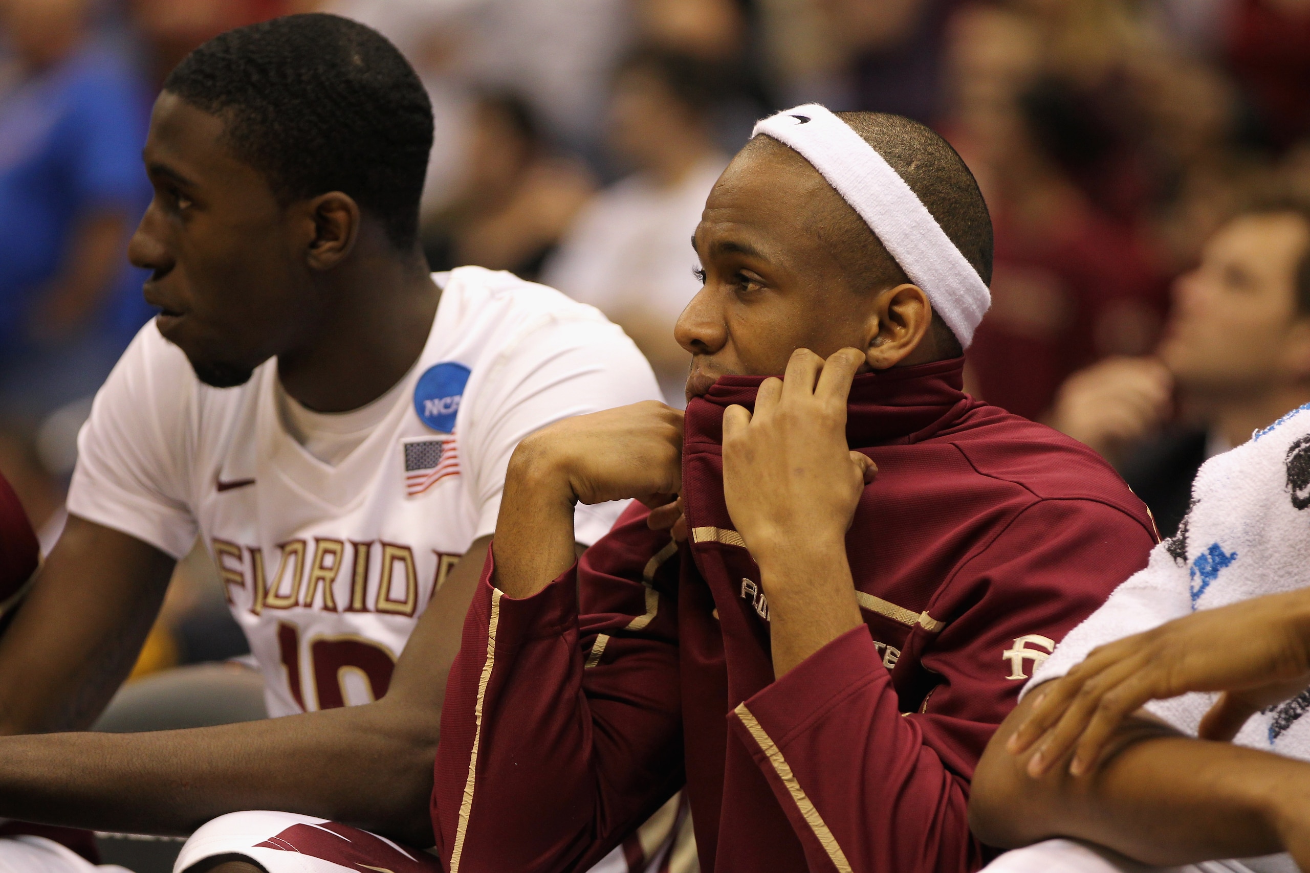 SAN ANTONIO, TX - MARCH 25:  Okaro White #10 (L) of the Florida State Seminoles reacts after the southwest regional of the 2011 NCAA men's basketball tournament against the Virginia Commonwealth Rams at the Alamodome on March 25, 2011 in San Antonio, Texa