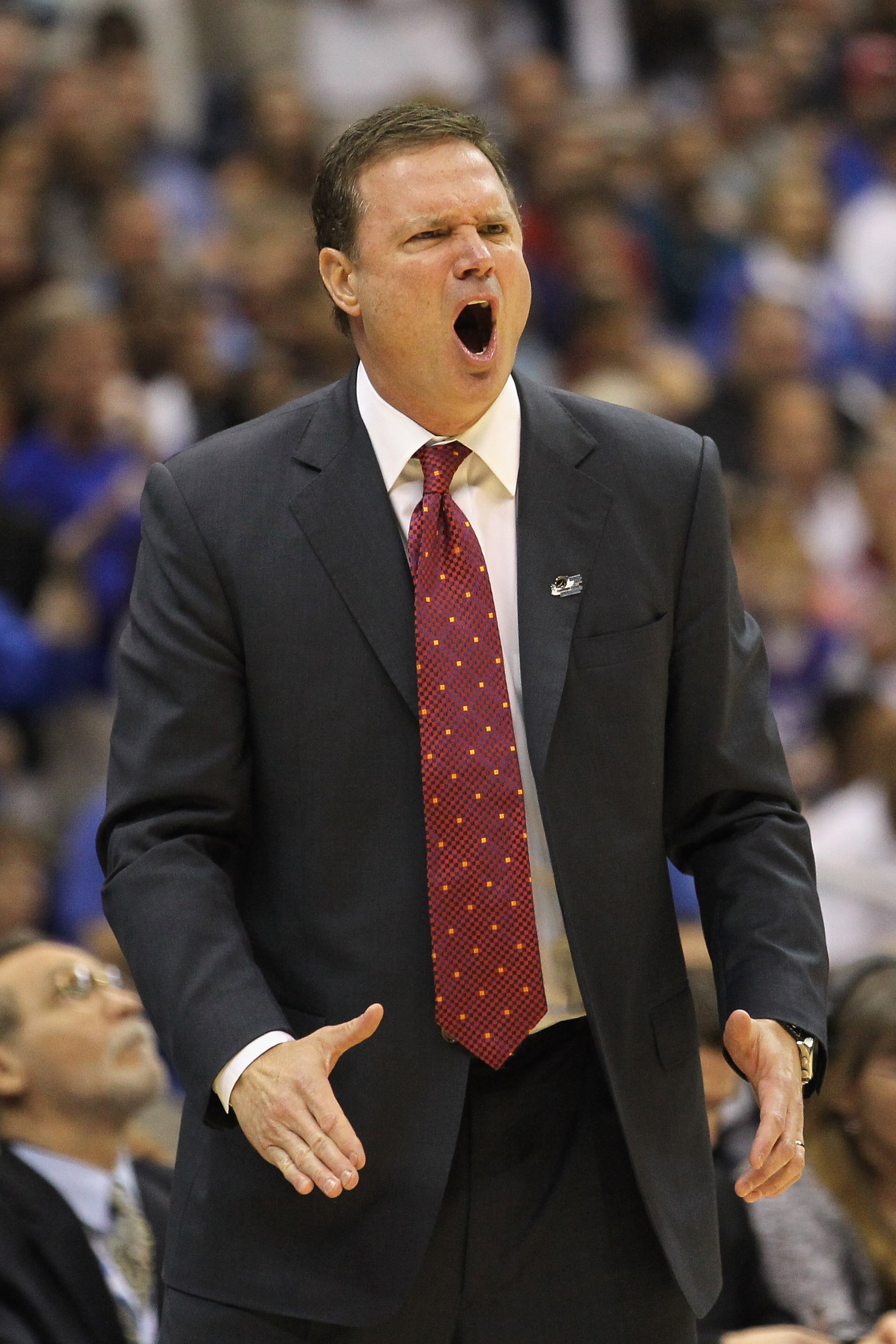 SAN ANTONIO, TX - MARCH 27:  Head coach Bill Self of the Kansas Jayhawks reacts during the southwest regional final of the 2011 NCAA men's basketball tournament against the Virginia Commonwealth Rams at the Alamodome on March 27, 2011 in San Antonio, Texa