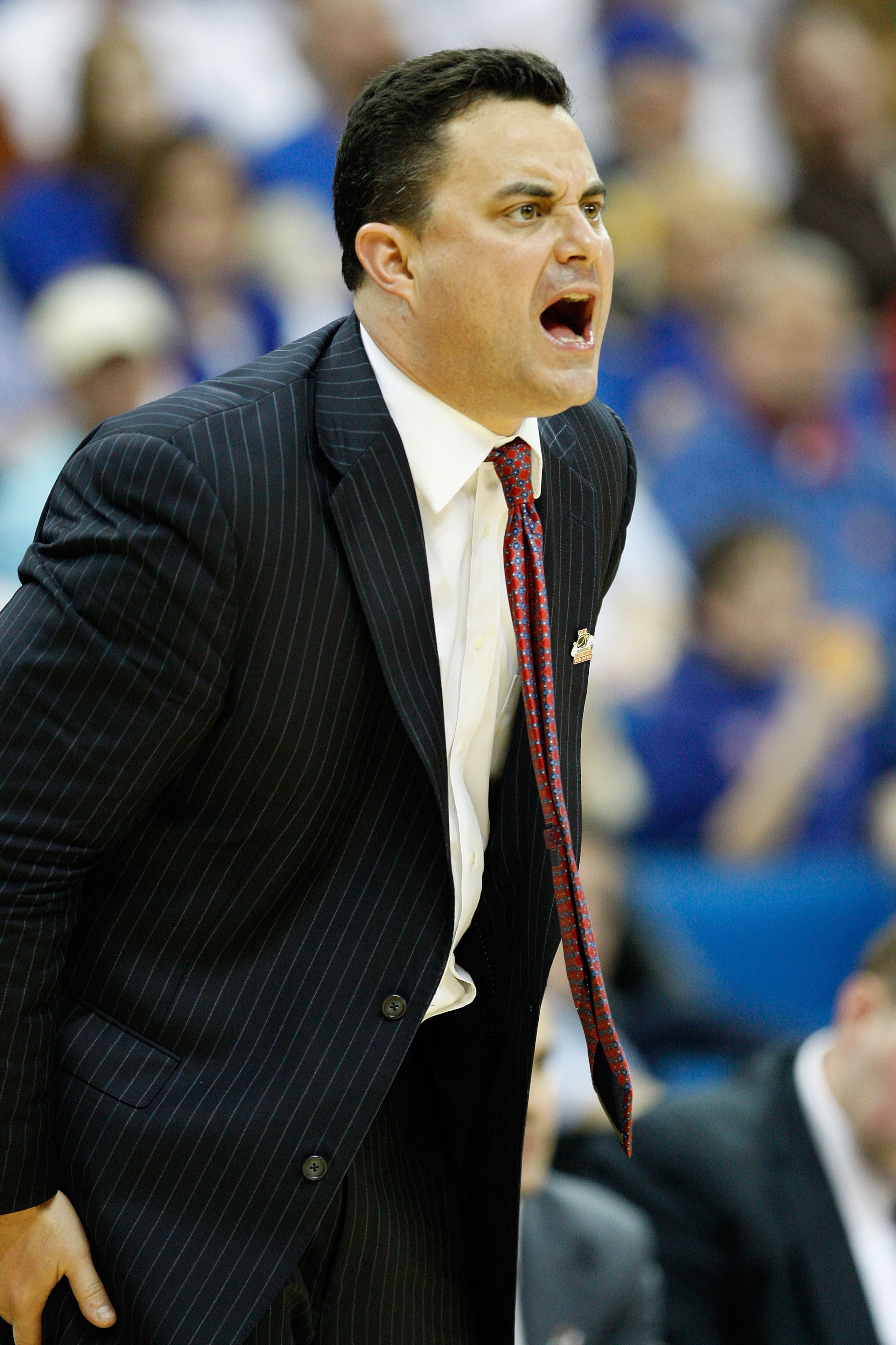 TULSA, OK - MARCH 20:  Head coach Sean Miller of the Arizona Wildcats stands on the sidelines during the third round game against the Texas Longhorns in the 2011 NCAA men's basketball tournament at BOK Center on March 20, 2011 in Tulsa, Oklahoma.  (Photo