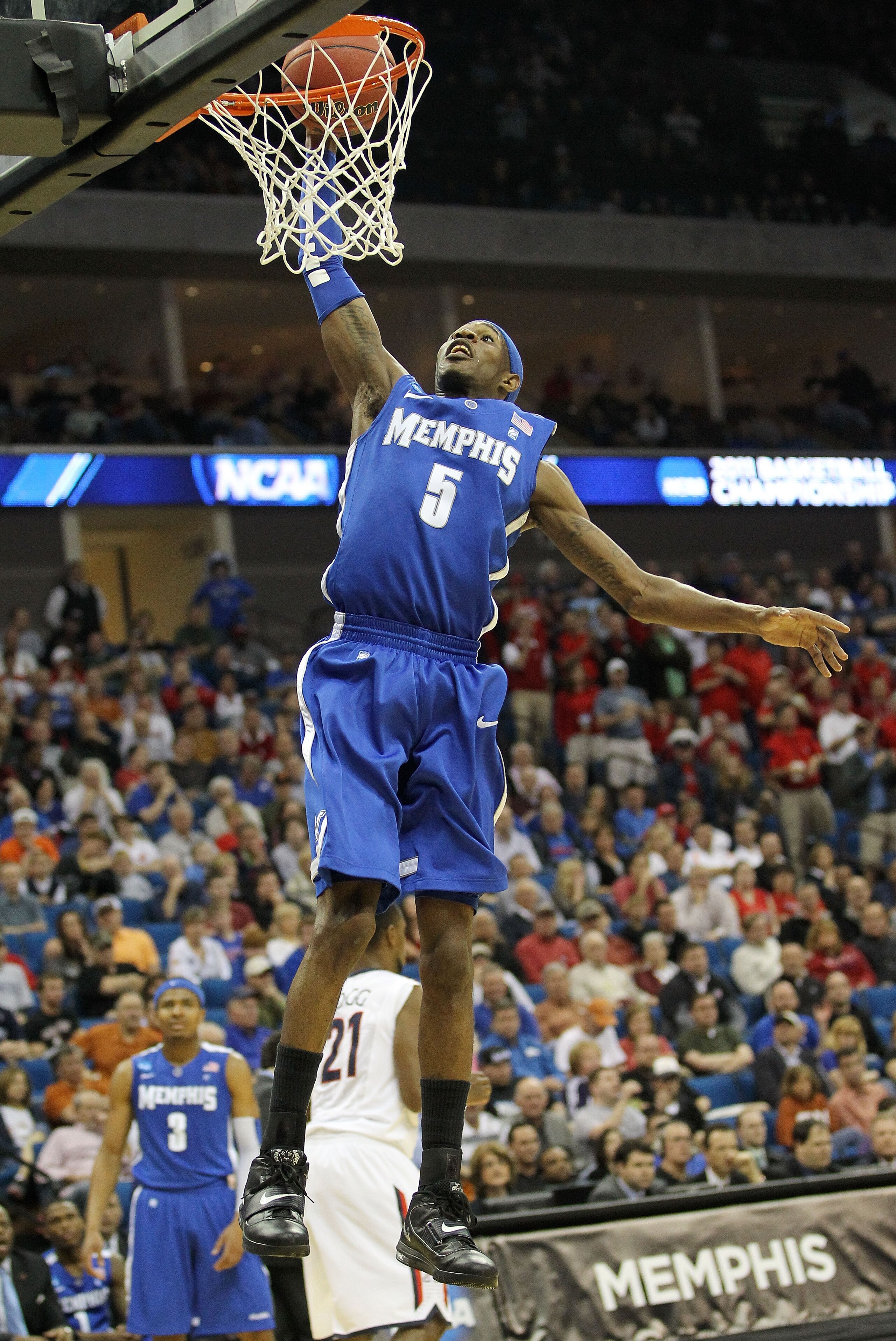 TULSA, OK - MARCH 18:  Will Barton #5 of the Memphis Tigers goes up to dunk the ball against the Arizona Wildcats during the second round game of the 2011 NCAA men's basketball tournament at BOK Center on March 18, 2011 in Tulsa, Oklahoma.  (Photo by Rona