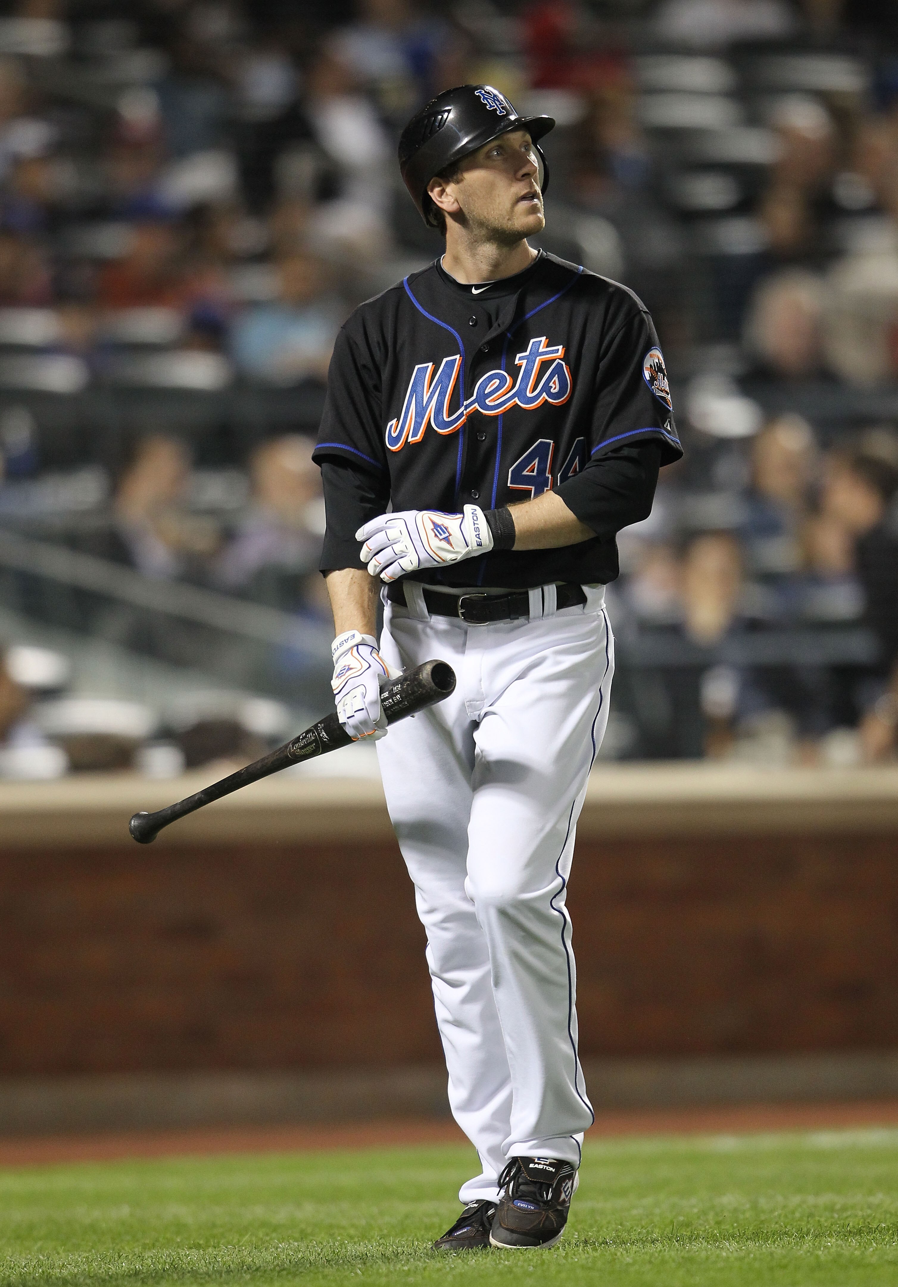 NEW YORK, NY - JUNE 03: Jason Bay #44 of the New York Mets walks the dugout after striking out against the Atlanta Braves at Citi Field on June 3, 2011 in the Flushing neighborhood of the Queens borough of New York City.  (Photo by Nick Laham/Getty Images