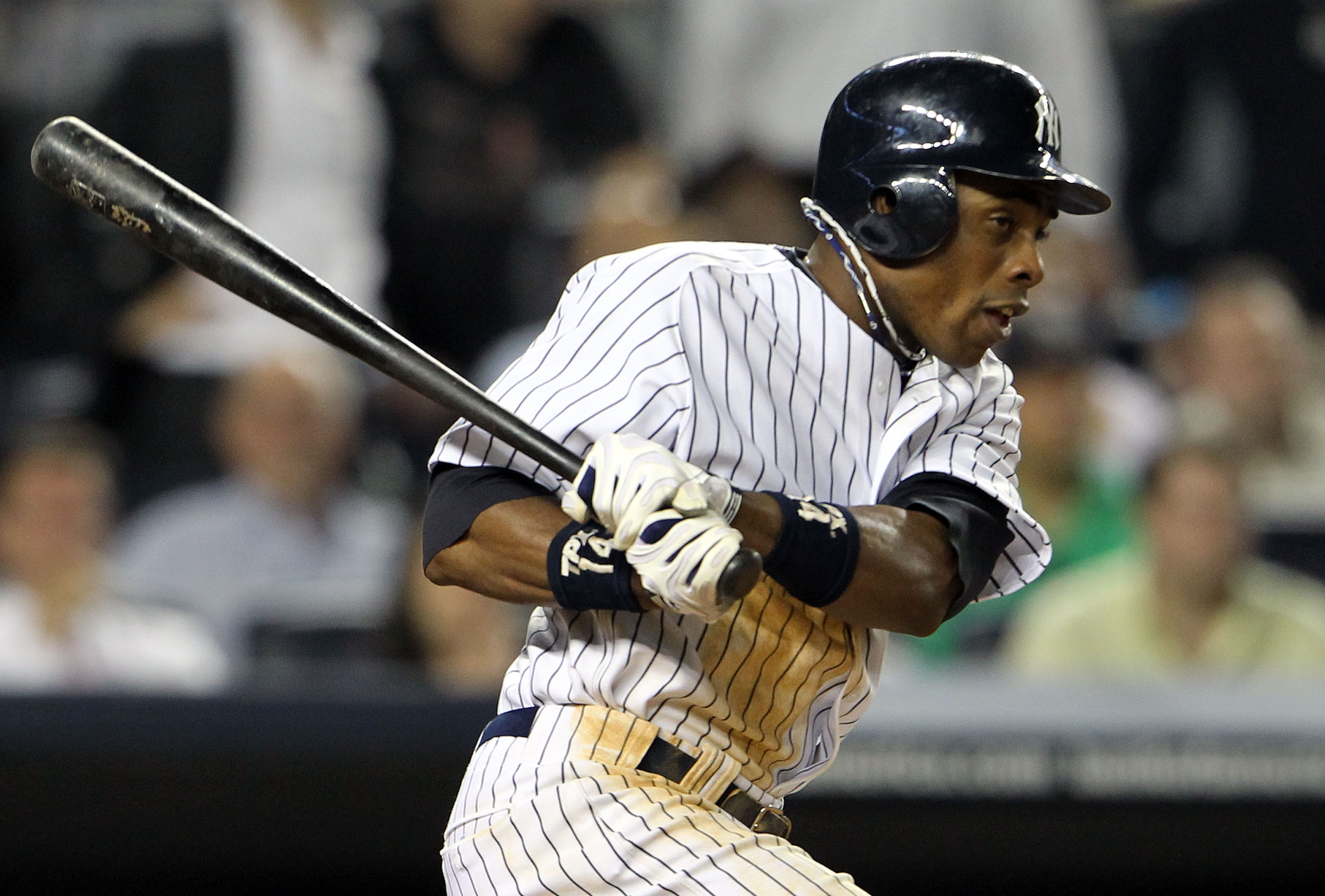 NEW YORK, NY - MAY 24: Curtis Granderson #14 of the New York Yankees hits an RBI single in the ninth inning against the Toronto Blue Jays at Yankee Stadium on May 24, 2011 in the Bronx borough of New York City. (Photo by Michael Heiman/Getty Images) NEW YORK, NY - MAY 24: Curtis Granderson #14 of the New York Yankees hits an RBI single in the ninth inning against the Toronto Blue Jays at Yankee Stadium on May 24, 2011 in the Bronx borough of New York City. (Photo by Michael Heiman/Getty Images)