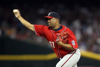 PHOENIX, AZ - JUNE 04:  Starting pitcher Livan Hernandez #61 of the Washington Nationals pitches against the Arizona Diamondbacks during the Major League Baseball game at Chase Field on June 4, 2011 in Phoenix, Arizona.  (Photo by Christian Petersen/Getty