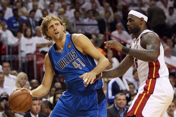 MIAMI, FL - JUNE 02:  Dirk Nowitzki #41 of the Dallas Mavericks drives on LeBron James #6 of the Miami Heat in the first quarter in Game Two of the 2011 NBA Finals at American Airlines Arena on June 2, 2011 in Miami, Florida. NOTE TO USER: User expressly