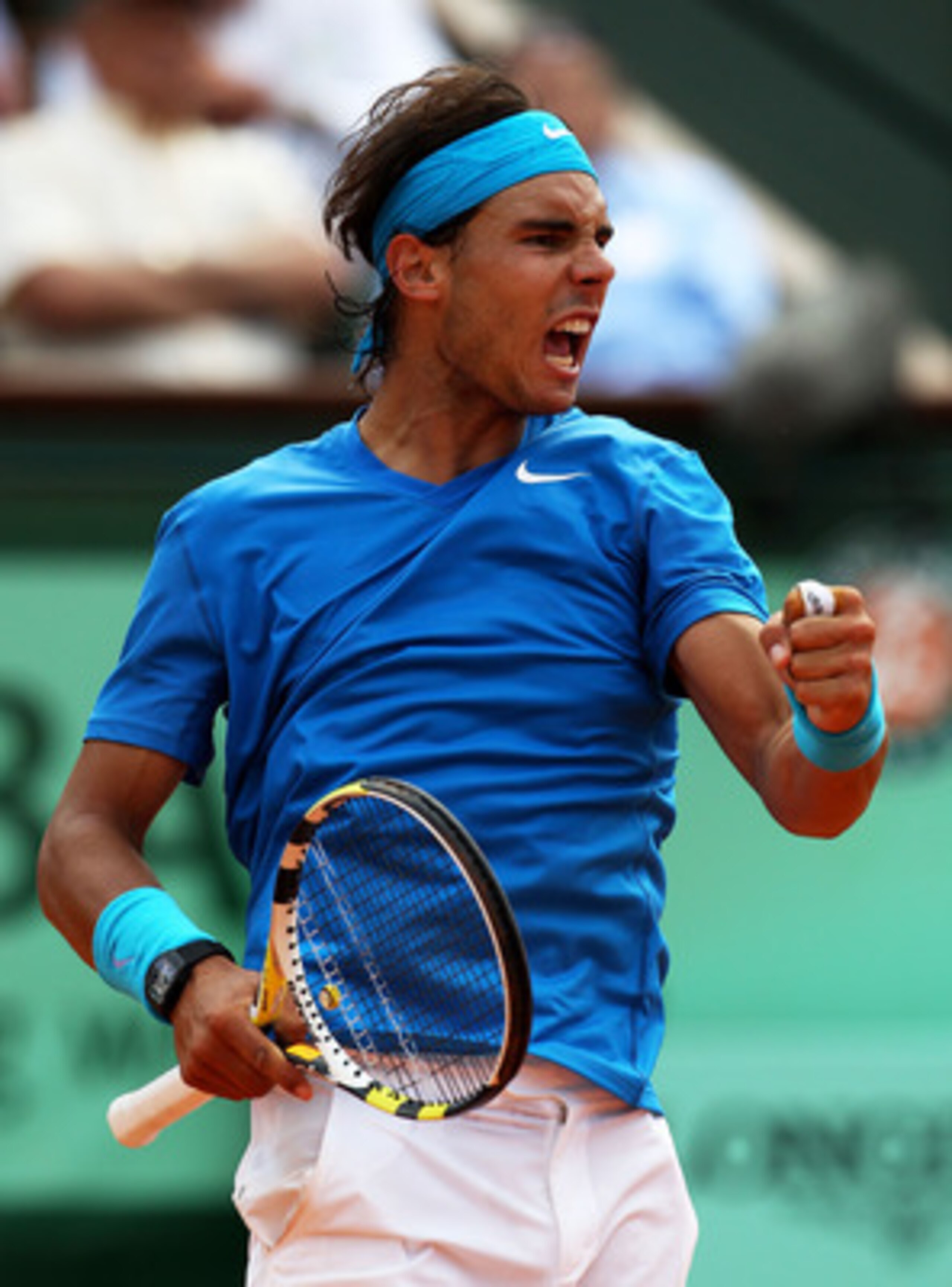 PARIS, FRANCE - JUNE 03:  Rafael Nadal of Spain celebrates a point during the men's singles semi final match between Rafael Nadal of Spain and Andy Murray of Great Britain on day thirteen of the French Open at Roland Garros on June 3, 2011 in Paris, Franc
