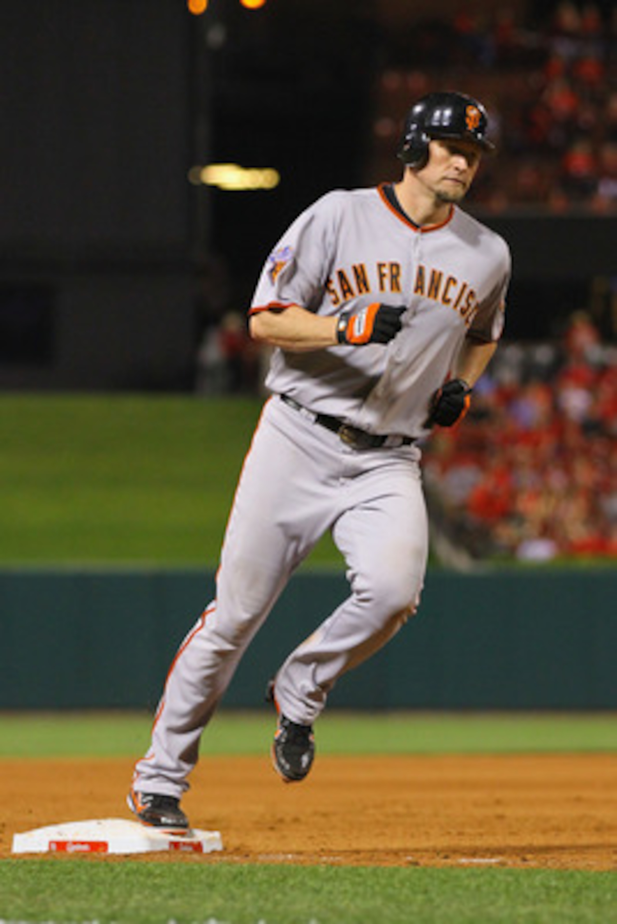 ST. LOUIS, MO - JUNE 2: Aubrey Huff #17 of the San Francisco Giants rounds third base after hitting his first of three home runs against the St. Louis Cardinals at Busch Stadium on June 2, 2011 in St. Louis, Missouri.  (Photo by Dilip Vishwanat/Getty Imag
