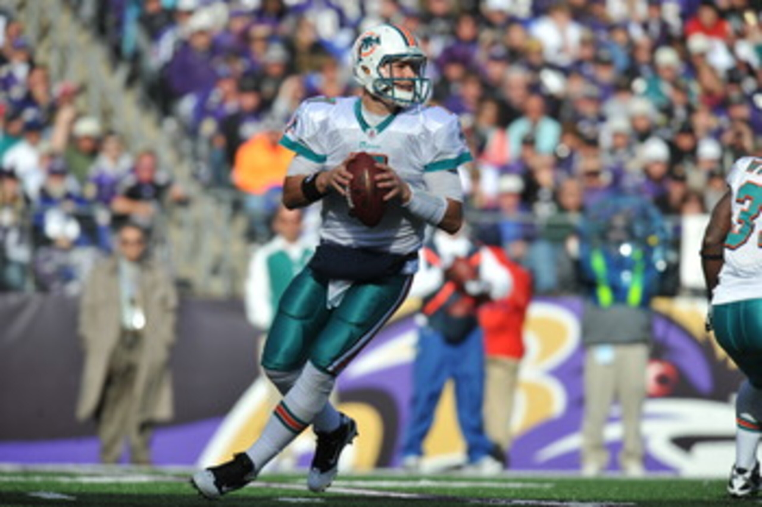 BALTIMORE, MD - NOVEMBER 7:  Chad Henne #7 of the Miami Dolphins looks for a receiver during the game against the Baltimore Ravens at M&T Bank Stadium on November 7, 2010 in Baltimore, Maryland. The Ravens defeated the Dolphins 26-10. (Photo by Larry Fren