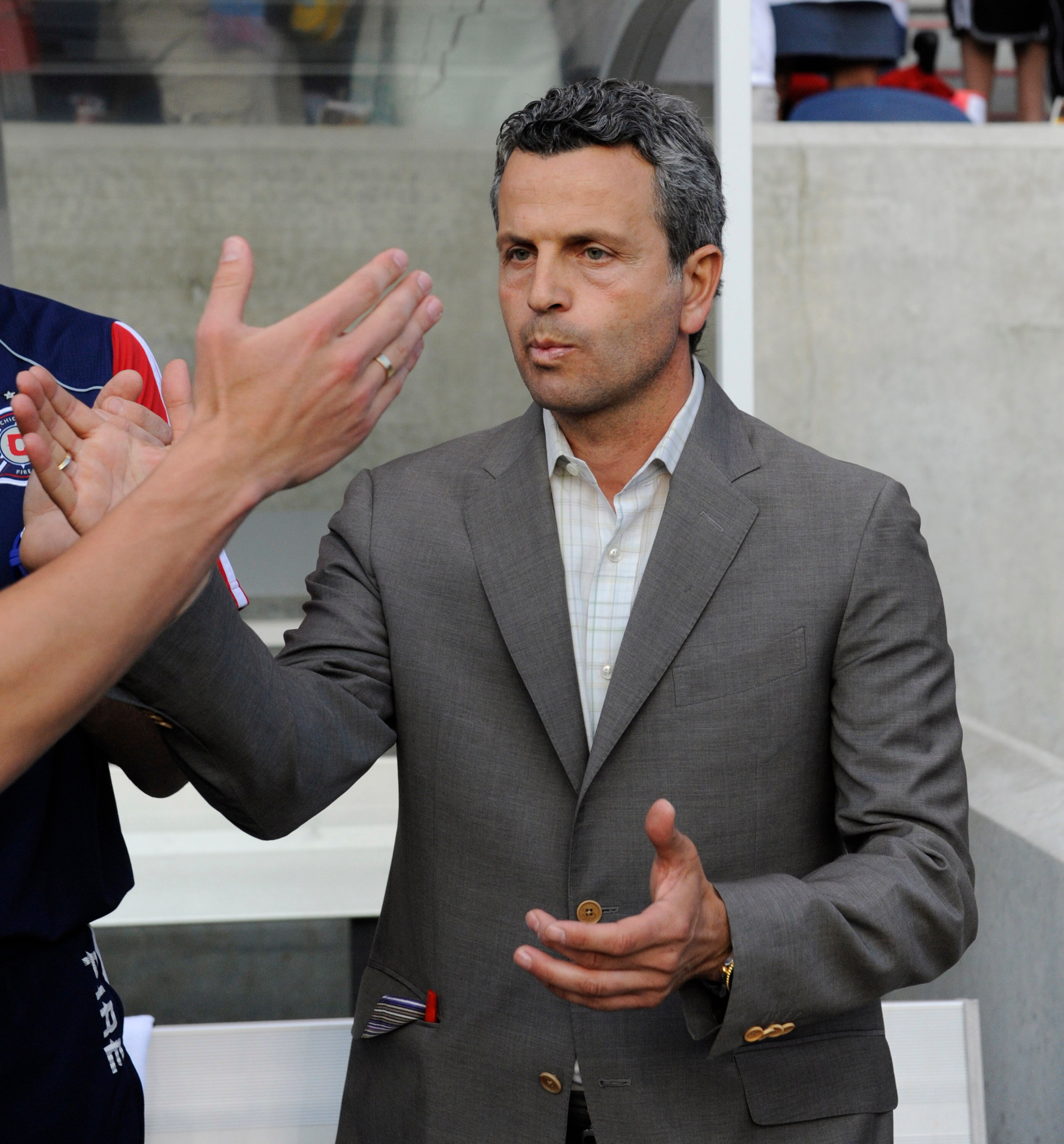 BRIDGEVIEW, IL - JUNE 4: The Chicago Fire's new head coach Frank Klopas gets handshakes before the Seattle Sounders FC game in an MLS match on June 4, 2011 at Toyota Park in Bridgeview, Illinois. The Fire and the Sounders game ended in a 0-0 tie.  (Photo