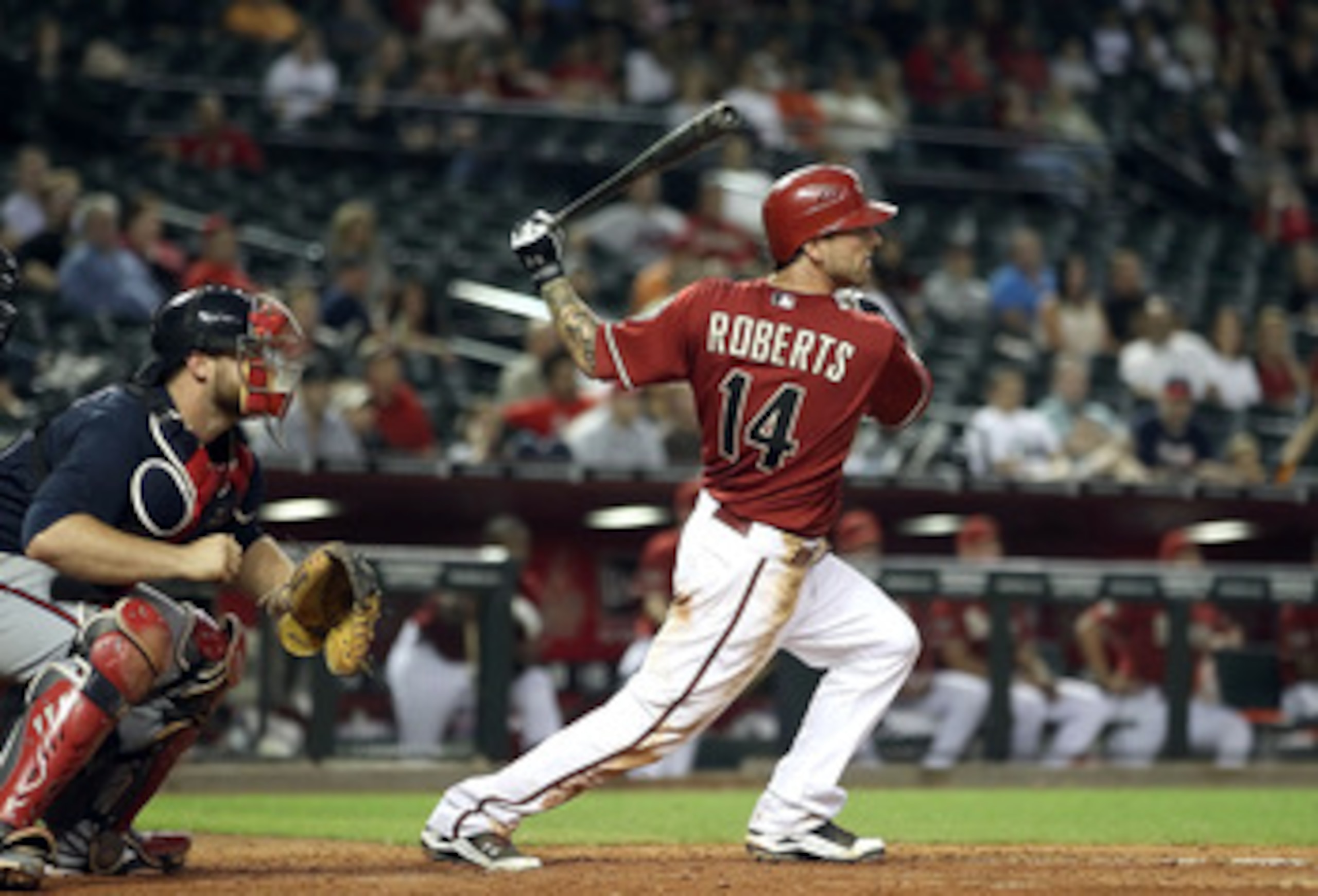 PHOENIX, AZ - MAY 18:  Ryan Roberts #14 of the Arizona Diamondbacks bats against the Atlanta Braves during the Major League Baseball game at Chase Field on May 18, 2011 in Phoenix, Arizona.  The Diamondbacks defeated the Braves 5-4 in eleven innings.  (Ph