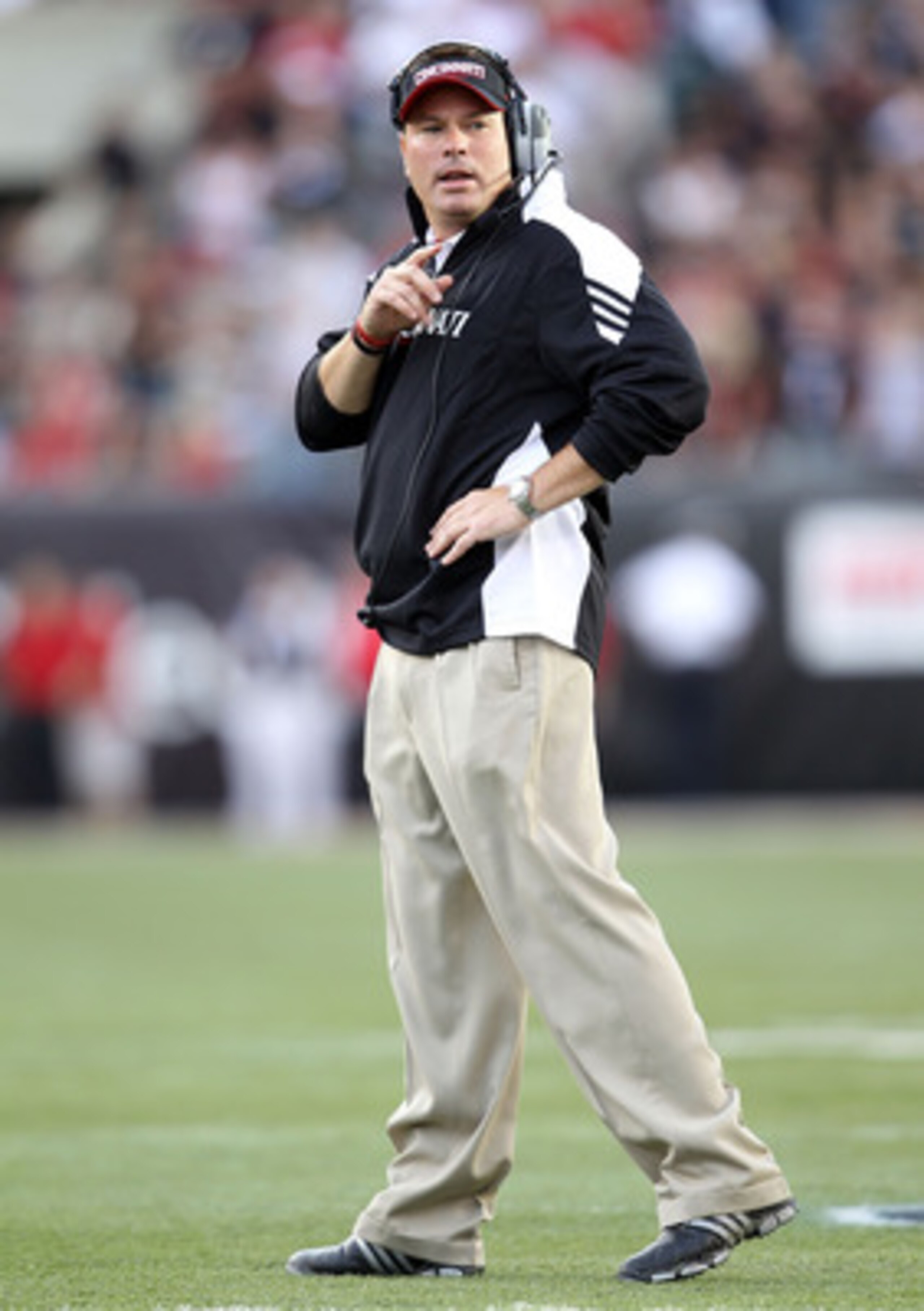 CINCINNATI - SEPTEMBER 25: Butch Jones the Head Coach of the Cincinnati Bearcats gives instructions to his team during the game against the Oklahoma Sooners at Paul Brown Stadium on September 25, 2010 in Cincinnati, Ohio. (Photo by Andy Lyons/Getty Imag CINCINNATI - SEPTEMBER 25: Butch Jones the Head Coach of the Cincinnati Bearcats gives instructions to his team during the game against the Oklahoma Sooners at Paul Brown Stadium on September 25, 2010 in Cincinnati, Ohio. (Photo by Andy Lyons/Getty Imag