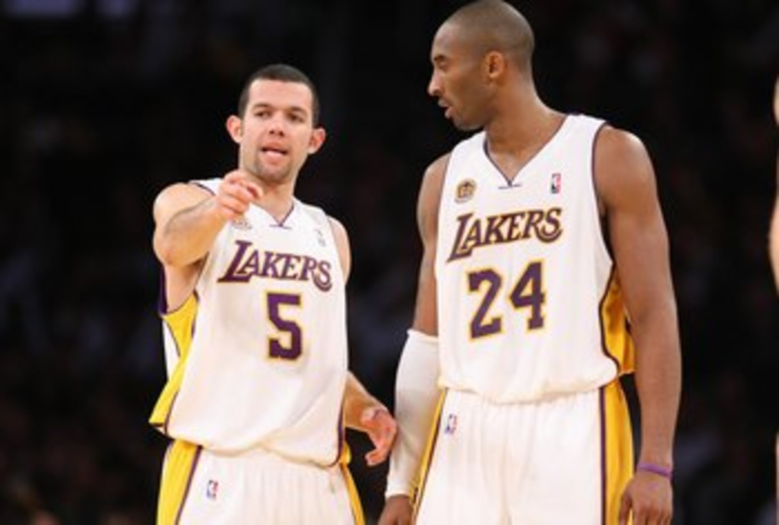 LOS ANGELES - JANUARY 27:  Jordan Farmar #5 and Kobe Bryant #24 of the Los Angeles Lakers talk on the court during the game against the Cleveland Cavaliers on January 27, 2008 at Staples Center in Los Angeles, California. The Cavaliers won 98-95.  NOTE TO