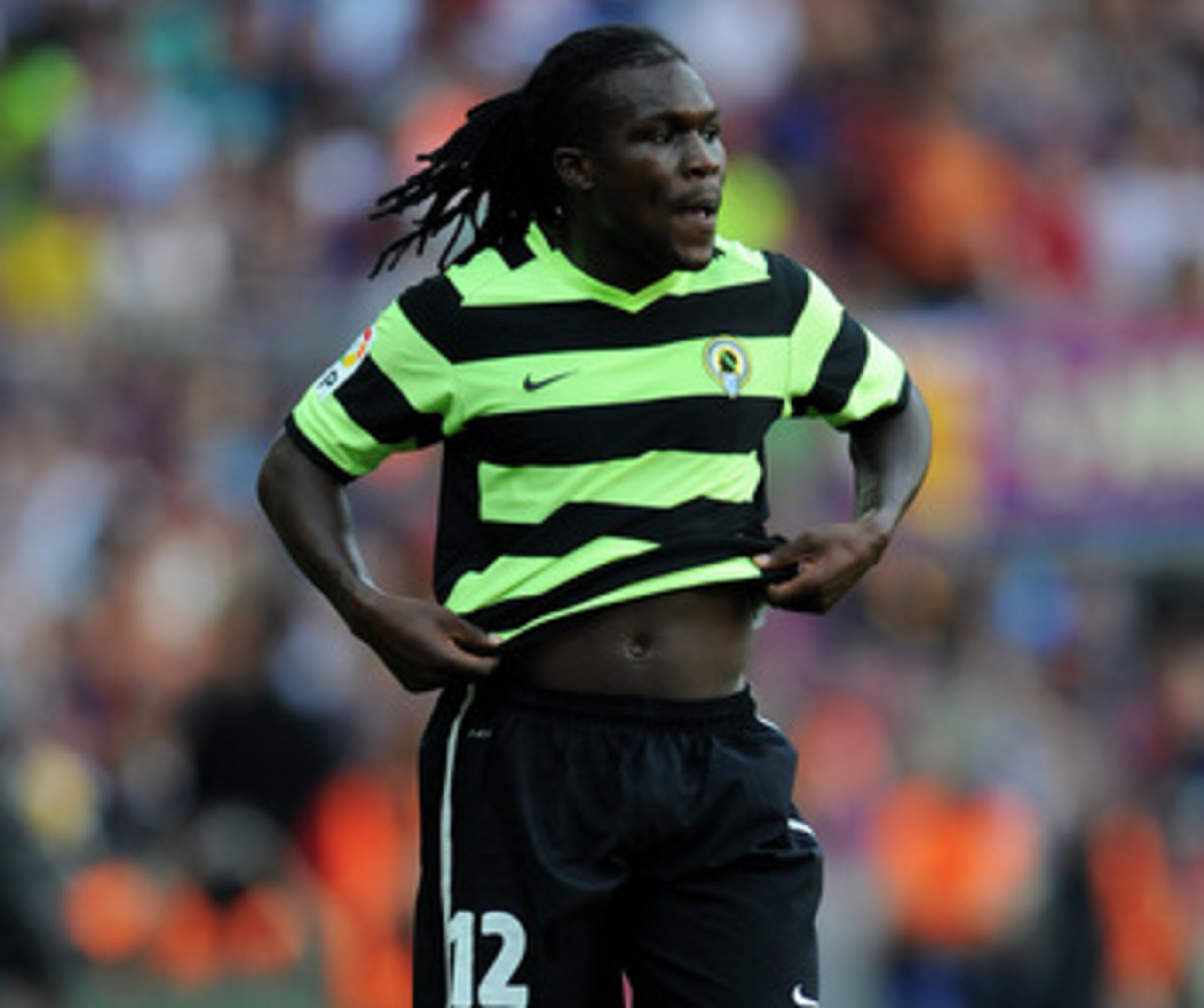 BARCELONA, SPAIN - SEPTEMBER 11:  Royston Drenthe of Hercules watches on during the La Liga match between Barcelona and Hercules at the Camp Nou stadium on September 11, 2010 in Barcelona, Spain. Barcelona lost the match 2-0.  (Photo by Jasper Juinen/Gett