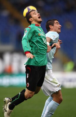 ROME - NOVEMBER 29:  Pablo Daniel Osvaldo of Bologna FC and Alexander Kolarov of SS Lazio in action during the Serie A match between Lazio and Bologna at Stadio Olimpico on November 29, 2009 in Rome, Italy.  (Photo by Paolo Bruno/Getty Images)