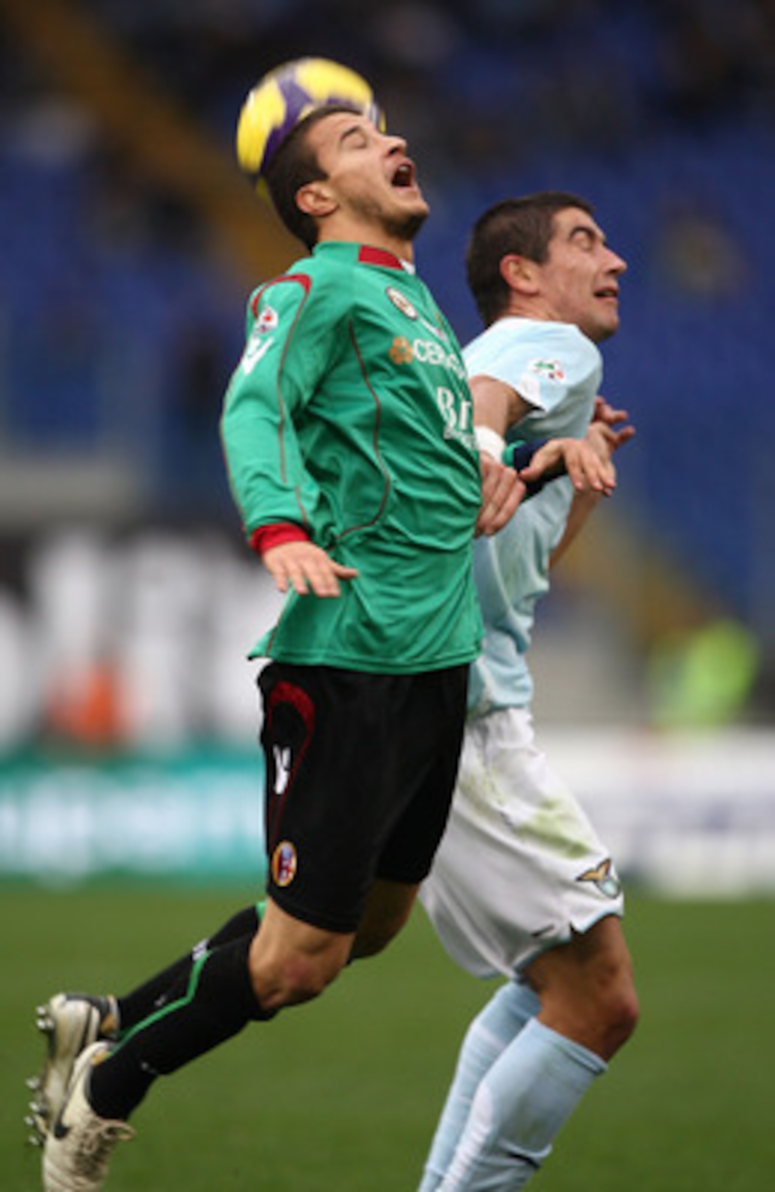 ROME - NOVEMBER 29:  Pablo Daniel Osvaldo of Bologna FC and Alexander Kolarov of SS Lazio in action during the Serie A match between Lazio and Bologna at Stadio Olimpico on November 29, 2009 in Rome, Italy.  (Photo by Paolo Bruno/Getty Images)