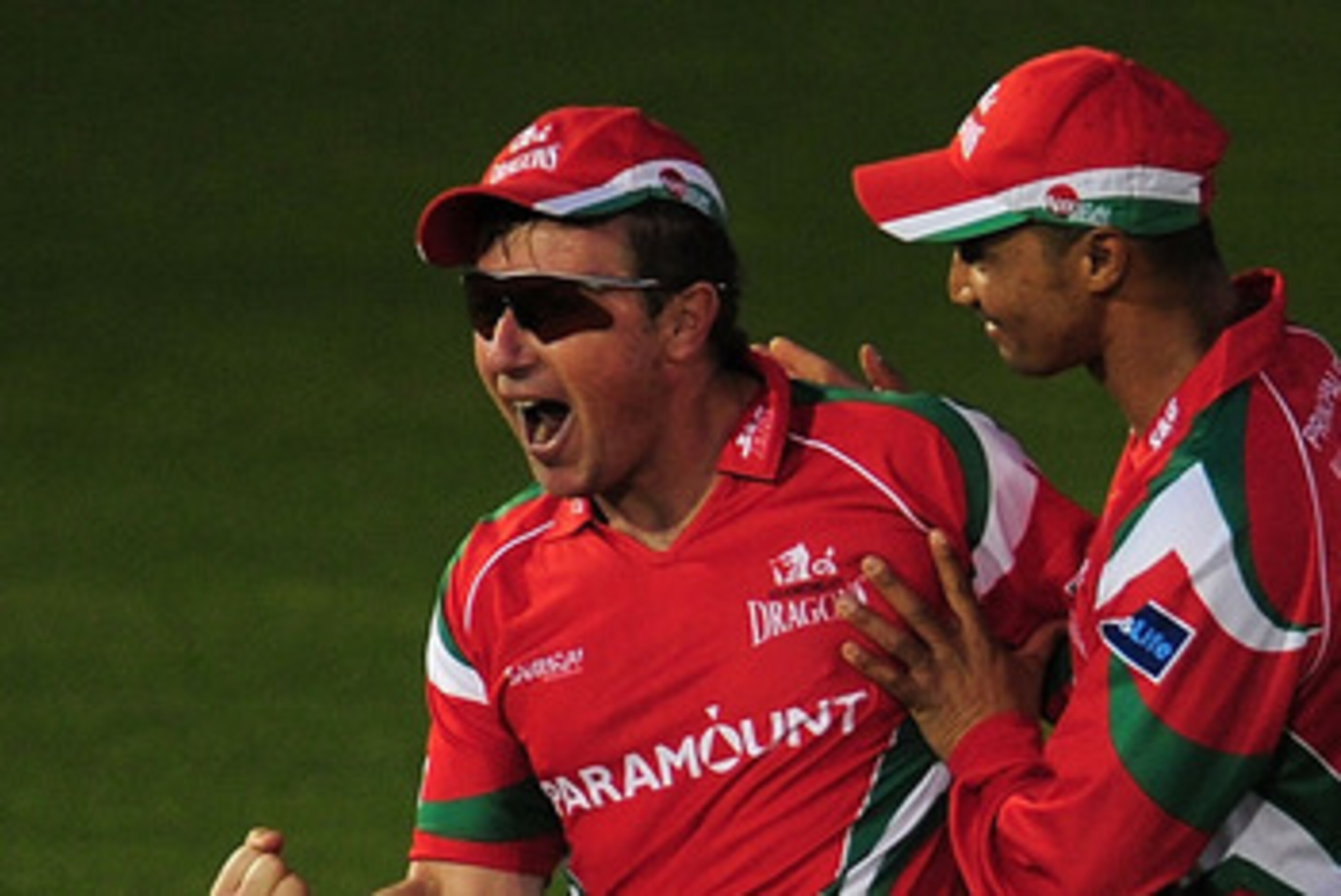 CARDIFF, WALES - JUNE 03:  Glamorgan fielder Robert Croft (l) celebrates with Alviro Petersen after taking a great catch to dismiss Scott Newman during the Friends Life T20 match between Glamorgan and Middlesex at the Swalec Stadium on June 3, 2011 in Car