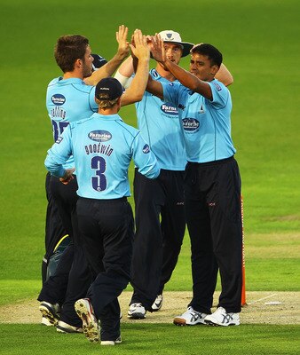 NOTTINGHAM, ENGLAND - JULY 26:  Yasir Arafat of Sussex is congratulated on bowling Alex Hales of Nottinghamshire during the Friends Provident T20 Quarter Final match between Nottinghamshire and Sussex at Trent Bridge on July 26, 2010 in Nottingham, Englan