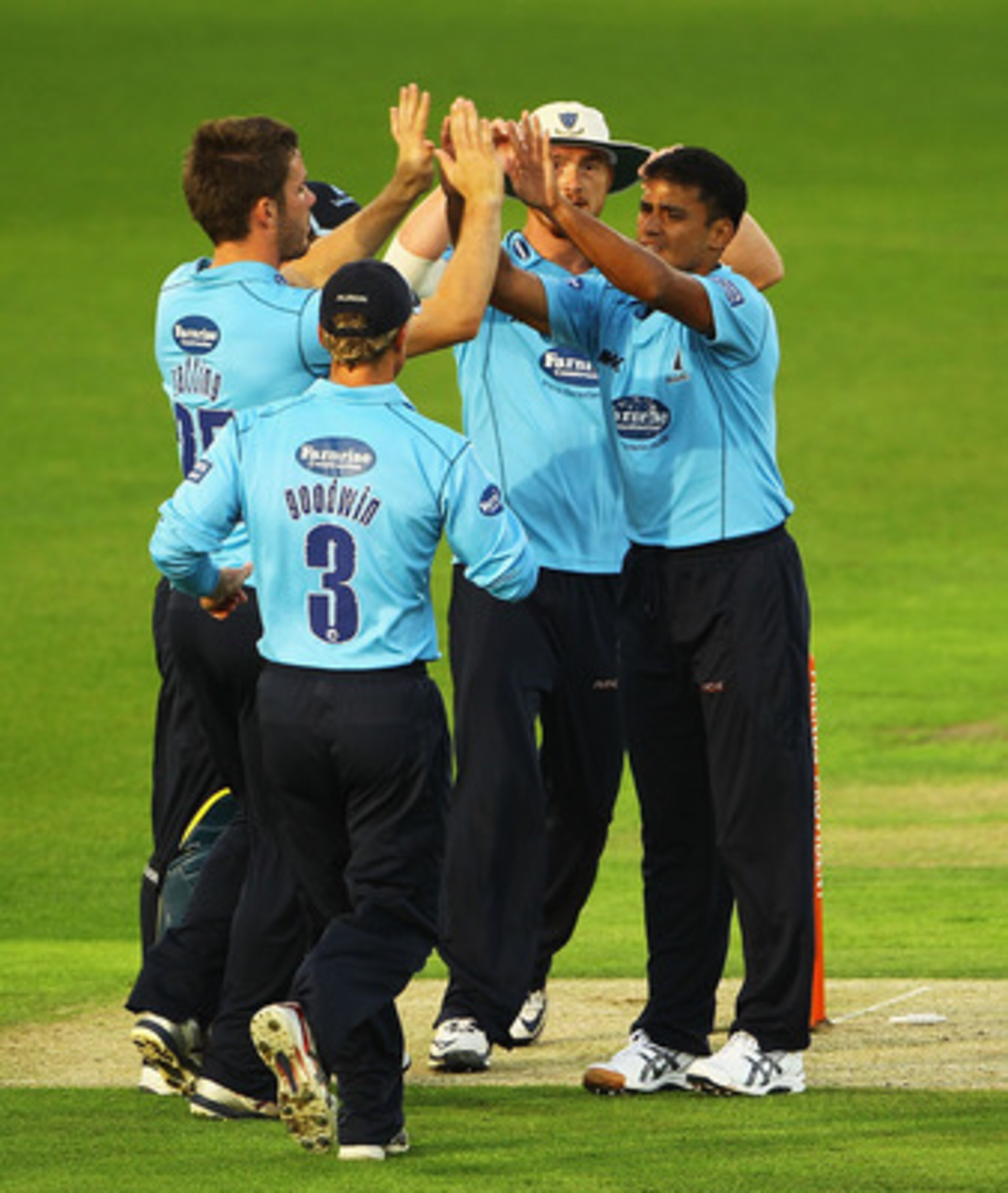 NOTTINGHAM, ENGLAND - JULY 26:  Yasir Arafat of Sussex is congratulated on bowling Alex Hales of Nottinghamshire during the Friends Provident T20 Quarter Final match between Nottinghamshire and Sussex at Trent Bridge on July 26, 2010 in Nottingham, Englan