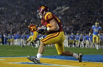 PASADENA, CA - DECEMBER 04:  Tight end Rhett Ellison #30 of the USC Trojans catches a pass for touchdown in the first quarter against the UCLA Bruins at the Rose Bowl on December 4, 2010 in Pasadena, California.  (Photo by Jeff Gross/Getty Images)