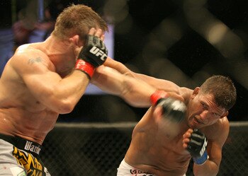 CHICAGO- OCTOBER 25: Sean Sherk (L) punches Tyson Griffin in a Lightweight bout at UFC's Ultimate Fight Night at Allstate Arena on October 25, 2008 in Chicago, Illinois. (Photo by Tasos Katopodis/Getty Images)