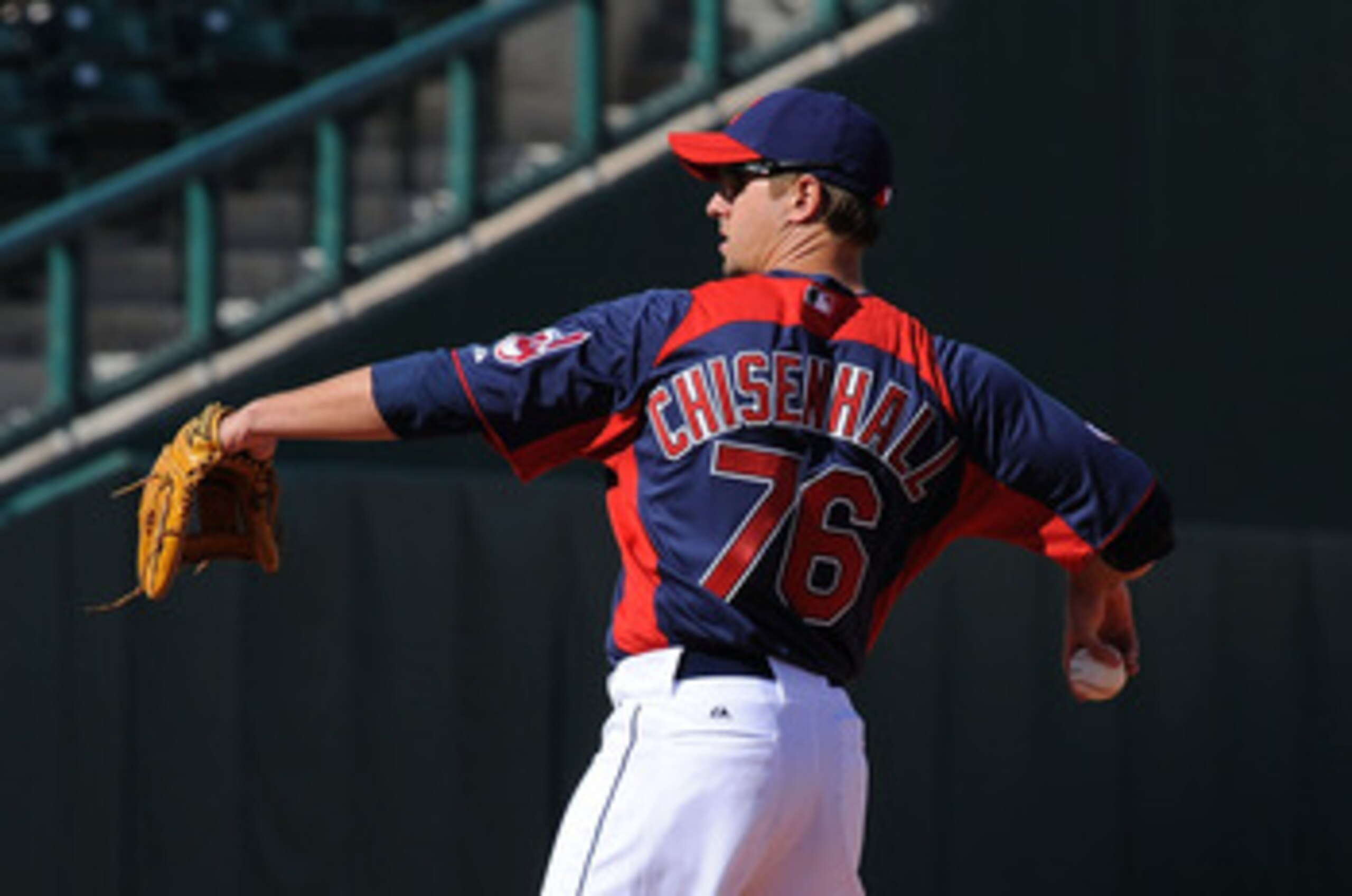 GOODYEAR, AZ - FEBRUARY 27:  Lonnie Chisenhall #76 of the Cleveland Indians throws the ball to third base in between innings against the Cincinnati Reds at Goodyear Ballpark on February 27, 2011 in Goodyear, Arizona.  (Photo by Norm Hall/Getty Images)