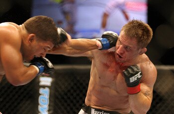 CHICAGO- OCTOBER 25:  Tyson Griffin (L) punches Sean Sherk in a Lightweight bout at UFC's Ultimate Fight Night at Allstate Arena on October 25, 2008 in Chicago, Illinois. (Photo by Tasos Katopodis/Getty Images)