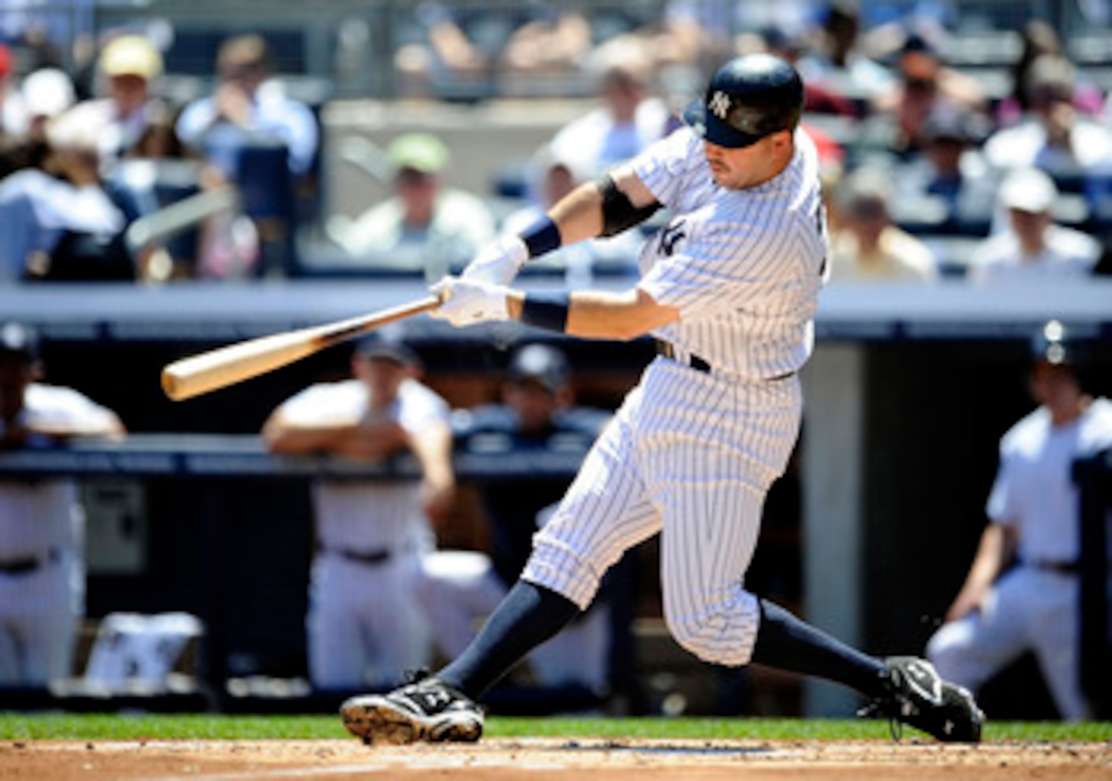 NEW YORK - MAY 05:  Nick Johnson #36 of the New York Yankees hits a solo home run against the Baltimore Orioles at Yankee Stadium on May 5, 2010 in the Bronx borough of New York City.  (Photo by Jeff Zelevansky/Getty Images)
