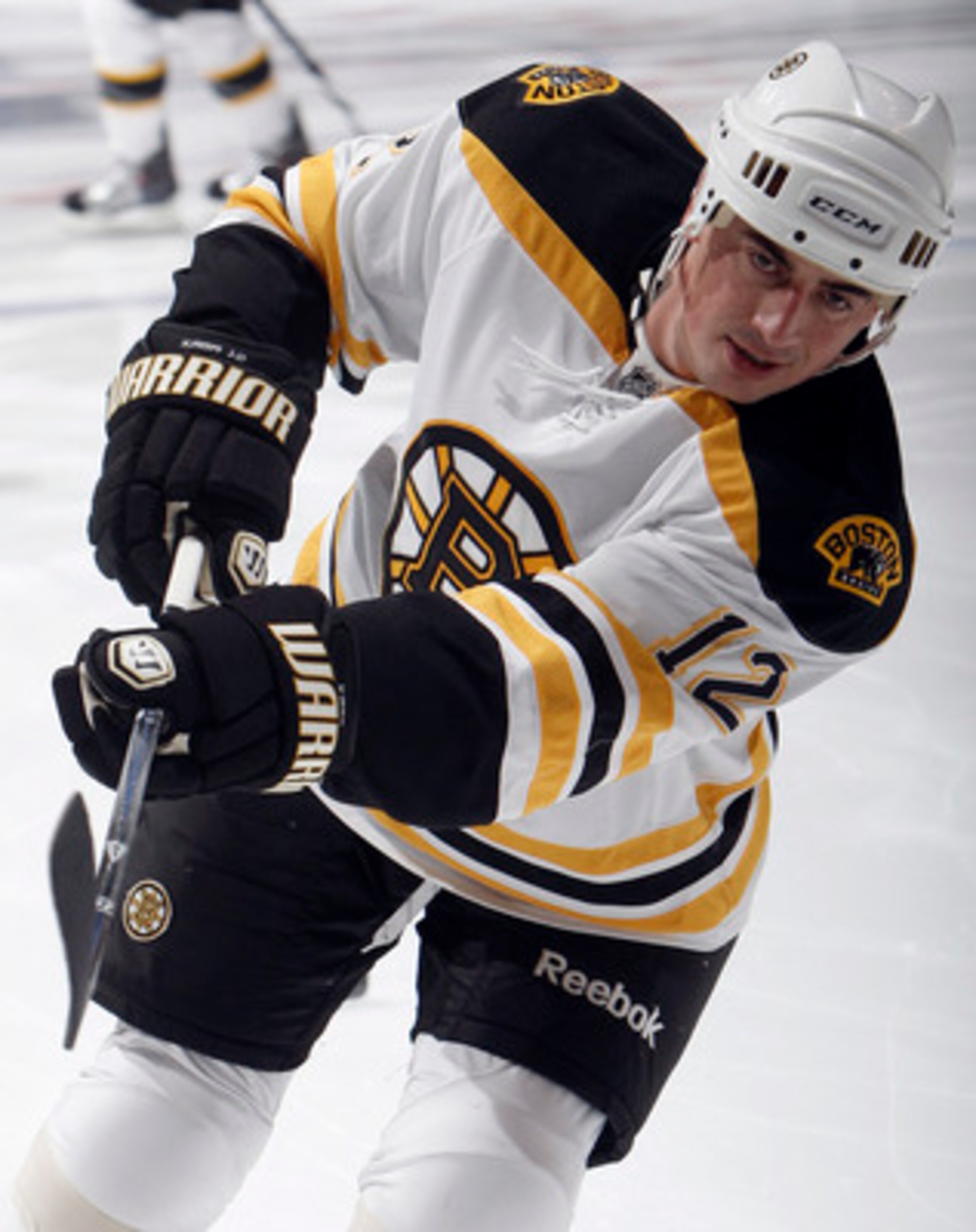 TORONTO, CANADA - MARCH 19: Tomas Kaberle #12 of the Boston Bruins shoots during warmup before game action at the Air Canada Centre against the Toronto Maple Leafs March 19, 2011 in Toronto, Ontario, Canada. (Photo by Abelimages/Getty Images)