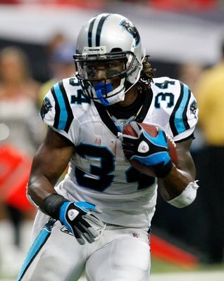 ATLANTA - SEPTEMBER 20:  DeAngelo Williams #34 of the Carolina Panthers is slow to get up against the Atlanta Falcons at Georgia Dome on September 20, 2009 in Atlanta, Georgia.  (Photo by Kevin C. Cox/Getty Images)