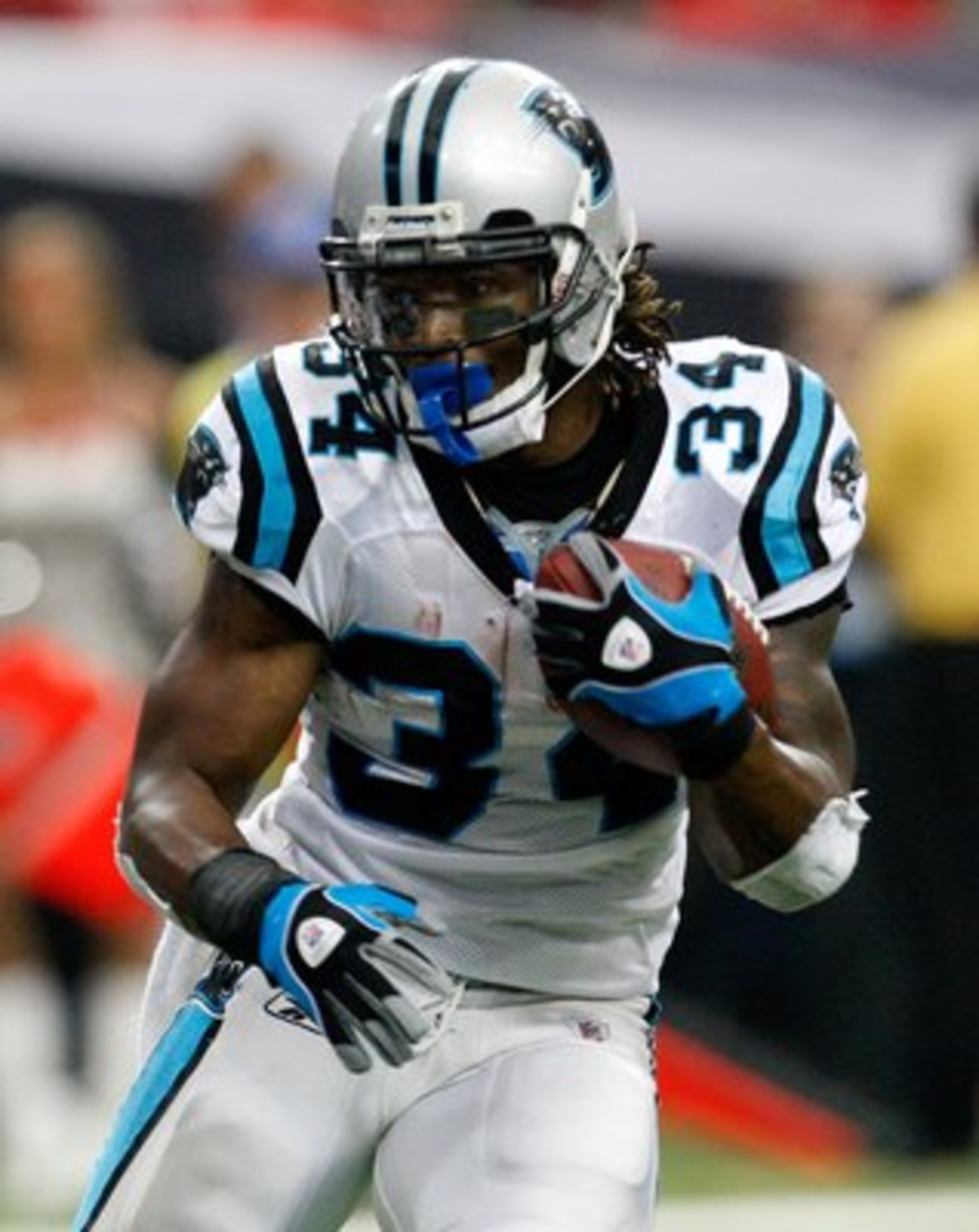 ATLANTA - SEPTEMBER 20:  DeAngelo Williams #34 of the Carolina Panthers is slow to get up against the Atlanta Falcons at Georgia Dome on September 20, 2009 in Atlanta, Georgia.  (Photo by Kevin C. Cox/Getty Images)