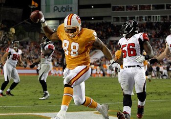 TAMPA, FL - DECEMBER 05:  Tight end John Gilmore #88 of the Tampa Bay Buccaneers catches a touchdown pass against the Atlanta Falcons during the game at Raymond James Stadium on December 5, 2010 in Tampa, Florida.  (Photo by J. Meric/Getty Images)