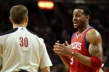 MIAMI, FL - MARCH 25:  Guard Andr Iguodala #9 of the Philadelphia Sixers argues with the referee against the Miami Heat at American Airlines Arena on March 25, 2011 in Miami, Florida. The Heat defeated the Sixers 111-99. NOTE TO USER: User expressly ackno