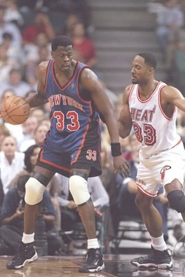7 May 1997:  Center Patrick Ewing of the New York Knicks tries to fend off center Alonzo Mourning of the Miami Heat during a playoff game at the Miami Arena in Miami, Florida.  The Knicks won the game 88-79. Mandatory Credit: Andy Lyons  /Allsport