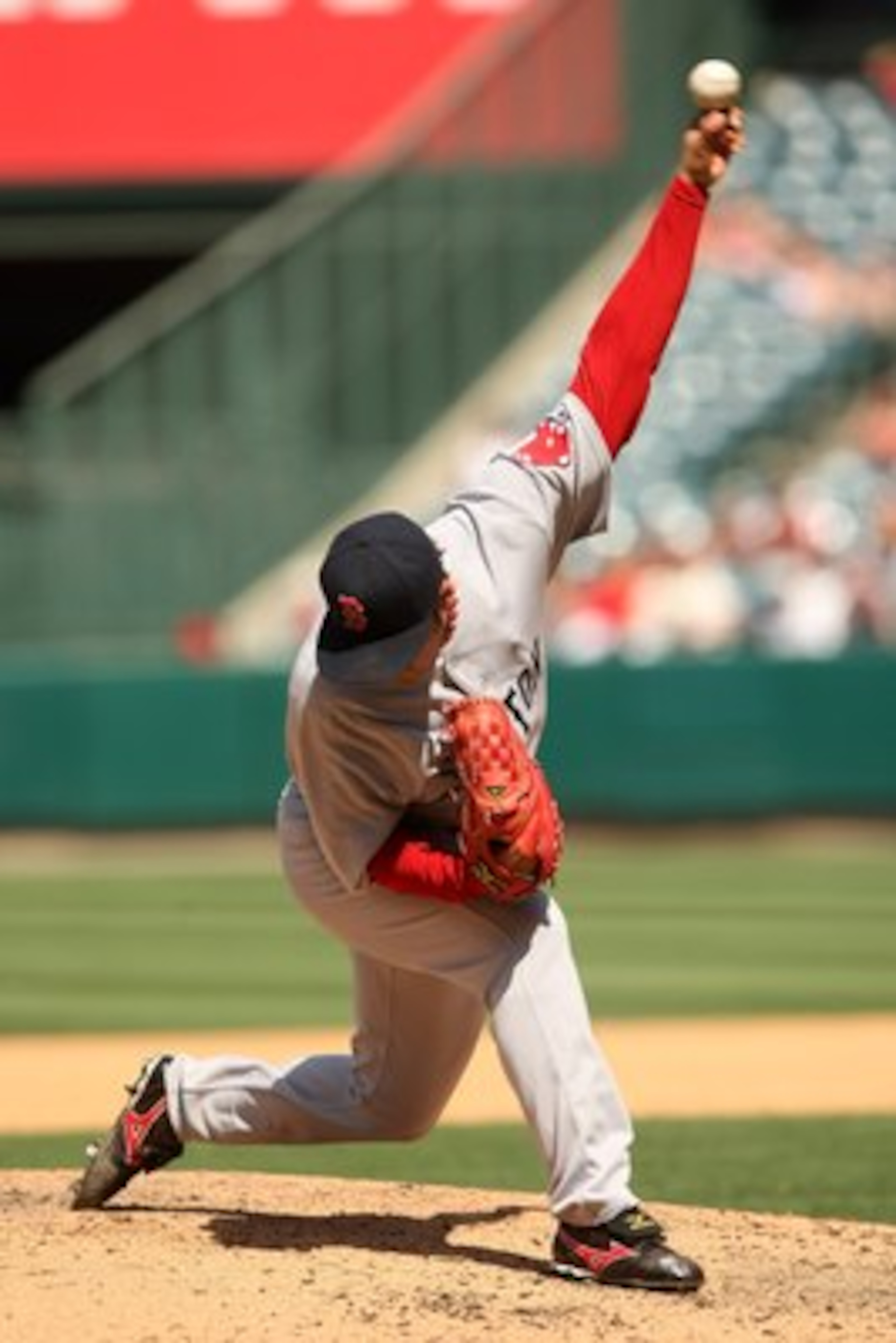ANAHEIM, CA - MAY 14:  Pitcher Hideki Okajima #37 of the Boston Red Sox throws a pitch against the Los Angeles Angels of Anaheim on May 14, 2009 at Angel Stadium in Anaheim, California.   The Angels won 5-4 in 12 innings.  (Photo by Stephen Dunn/Getty Ima