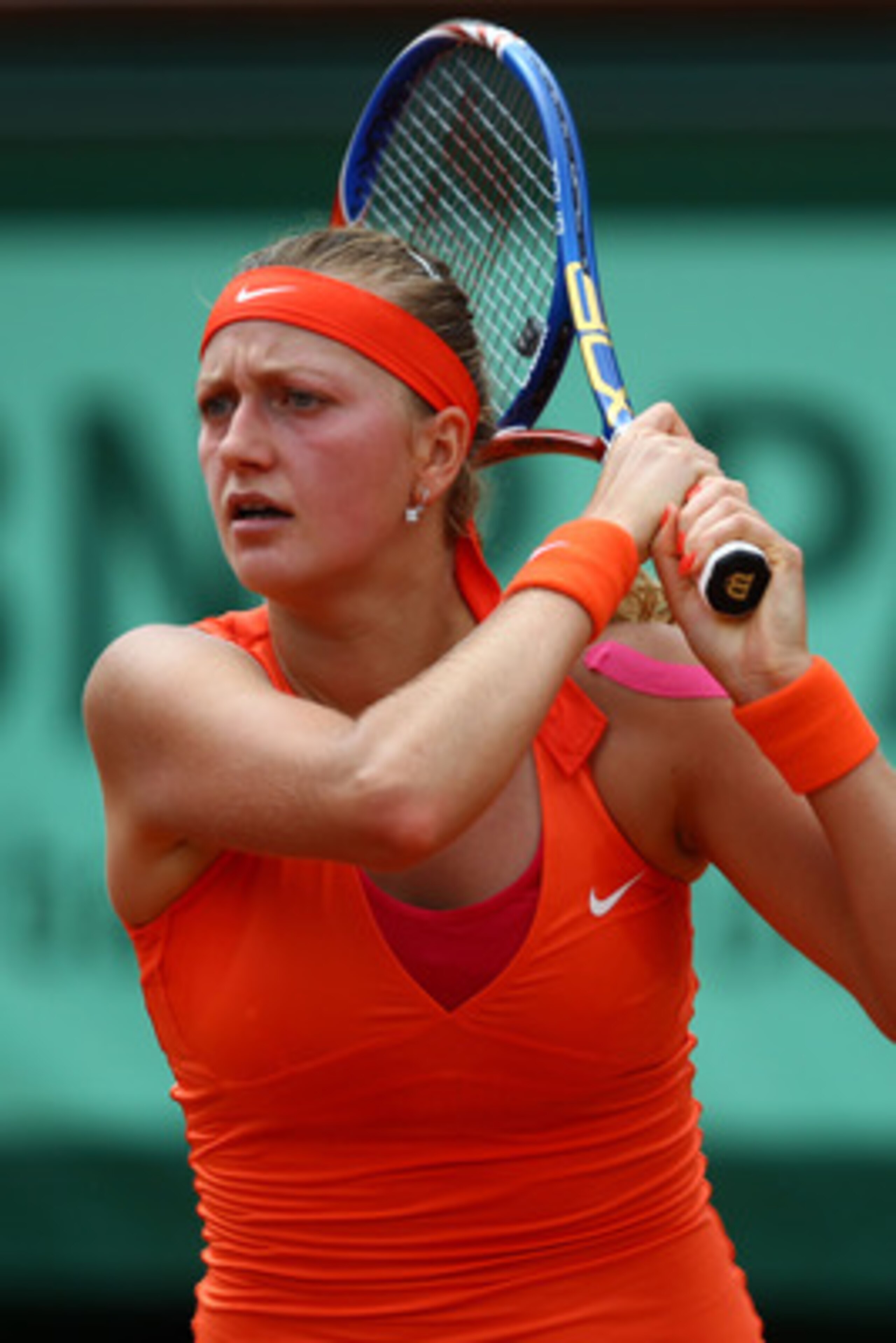 PARIS, FRANCE - MAY 30:  Petra Kvitova of Czech Republic hits a forehandduring the women's singles round four match between Na Li of China and Petra Kvitova of Czech Republic on day nine of the French Open at Roland Garros on May 30, 2011 in Paris, France