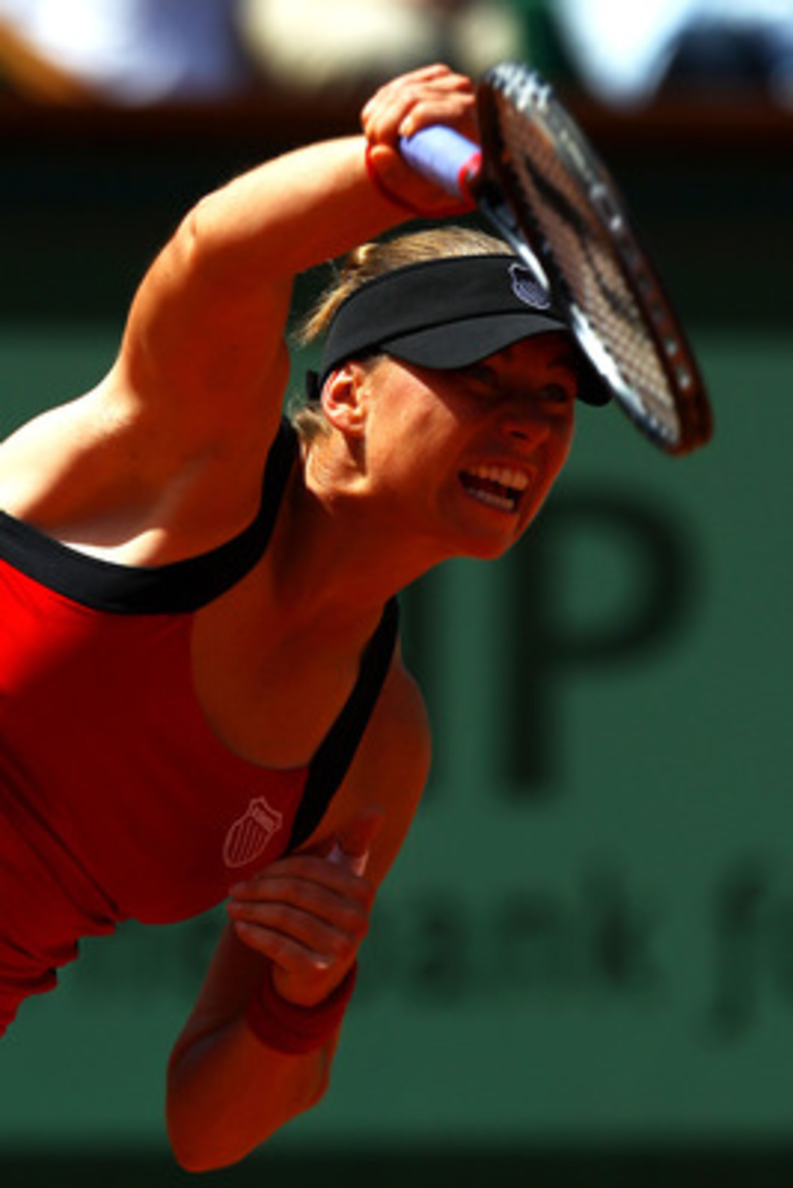 PARIS, FRANCE - MAY 29:  Vera Zvonareva of Russia serves during the women's singles round four match between Vera Zvonareva of Russia and Anastasia Pavlyuchenkova of Russia on day eight of the French Open at Roland Garros on May 29, 2011 in Paris, France.