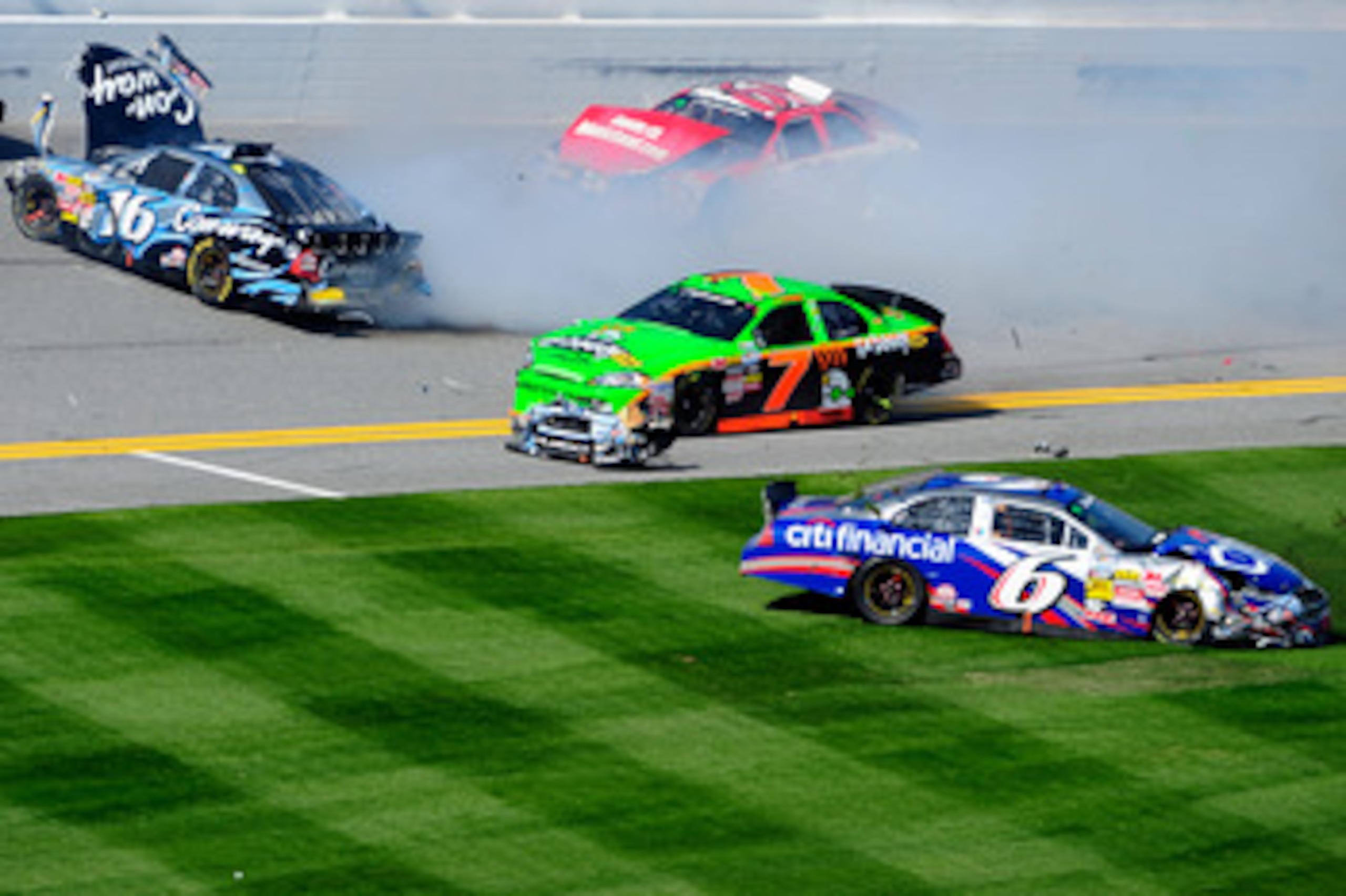 DAYTONA BEACH, FL - FEBRUARY 13: Danica Patrick, driver of the #7 GoDaddy.com Chevrolet, Colin Braun, driver of the #16 Con-way Freight Ford and Ricky Stenhouse Jr., driver of the #6 CitiFinancial Ford, crash during the NASCAR Nationwide Series Drive4COP DAYTONA BEACH, FL - FEBRUARY 13: Danica Patrick, driver of the #7 GoDaddy.com Chevrolet, Colin Braun, driver of the #16 Con-way Freight Ford and Ricky Stenhouse Jr., driver of the #6 CitiFinancial Ford, crash during the NASCAR Nationwide Series Drive4COP
