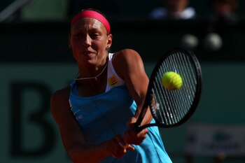 PARIS, FRANCE - MAY 28:  Yanina Wickmayer of Belgium hits a backhand during the women's singles round three match between Yanina Wickmayer of Belgium and Agnieszka Radwanska of Poland on day seven of the French Open at Roland Garros on May 28, 2011 in Par