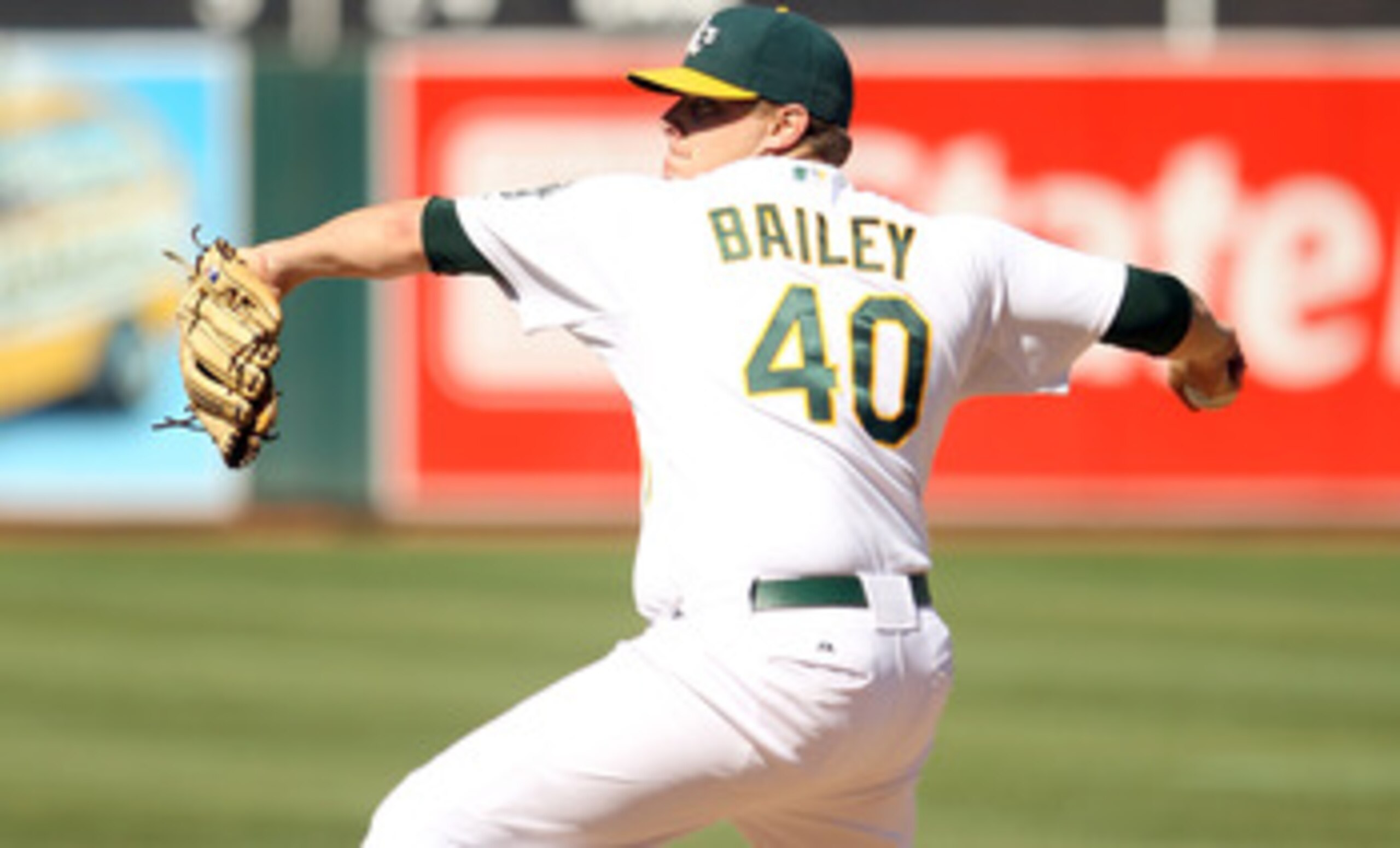 OAKLAND, CA - SEPTEMBER 06:  Andrew Bailey #40 of the Oakland Athletics pitches against the Seattle Mariners at the Oakland-Alameda County Coliseum on September 6, 2010 in Oakland, California.  (Photo by Ezra Shaw/Getty Images)