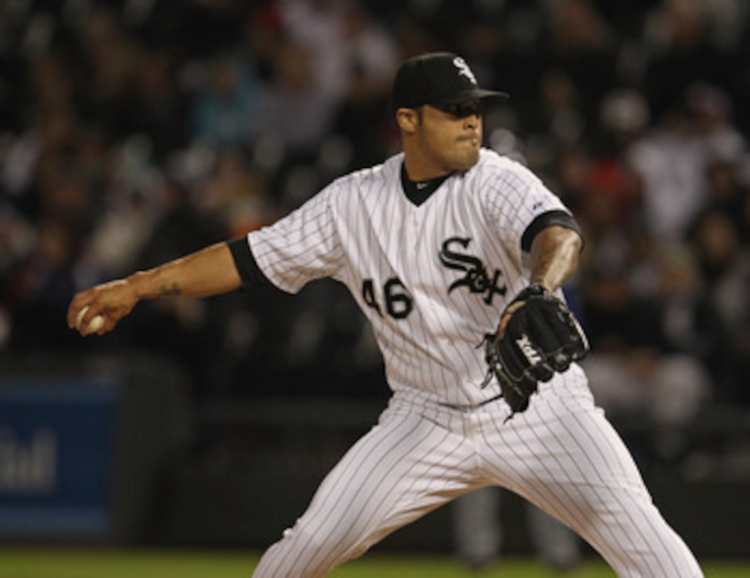 CHICAGO, IL - MAY 17: Sergio Santos #46 of the Chicago White Sox pitches against the Texas Rangers at U.S. Cellular Field on May 17, 2011 in Chicago, Illinois. The White Sox defeated the Rangers 4-3. (Photo by Jonathan Daniel/Getty Images)