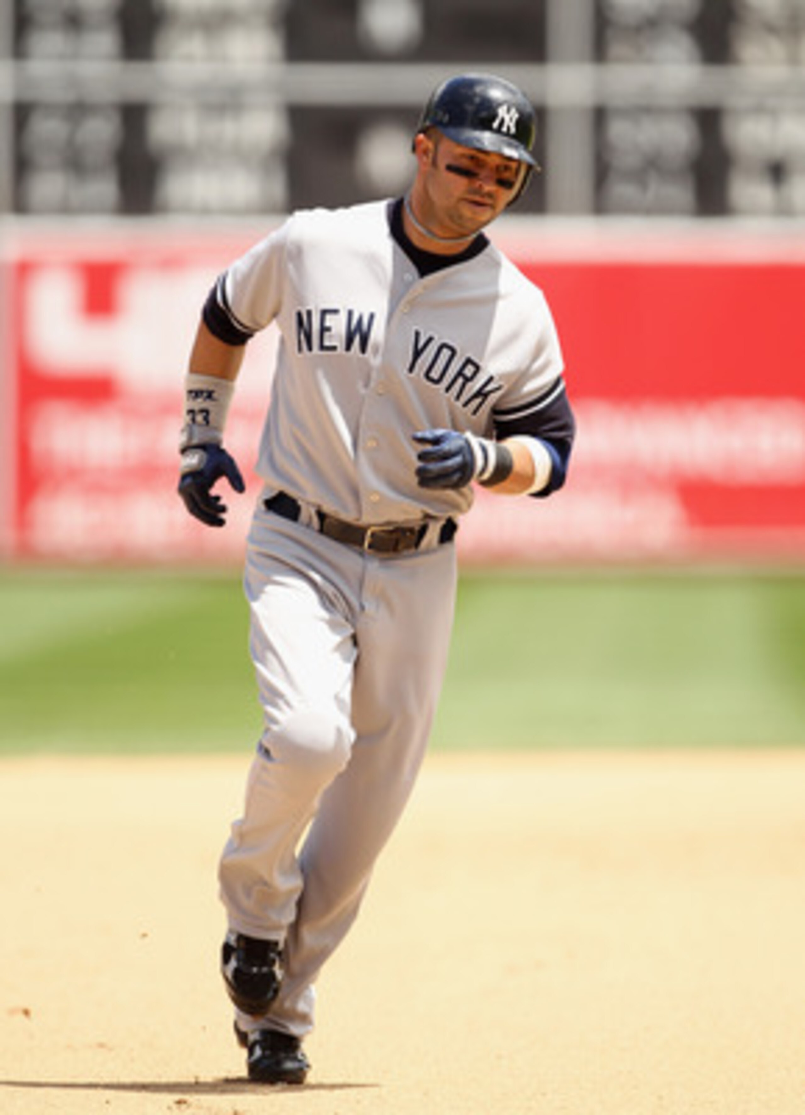 OAKLAND, CA - JUNE 01:  Nick Swisher #33 of the New York Yankees rounds the bases after he hit a three run home run in the fourth inning against the Oakland Athletics at Oakland-Alameda County Coliseum on June 1, 2011 in Oakland, California.  (Photo by Ez