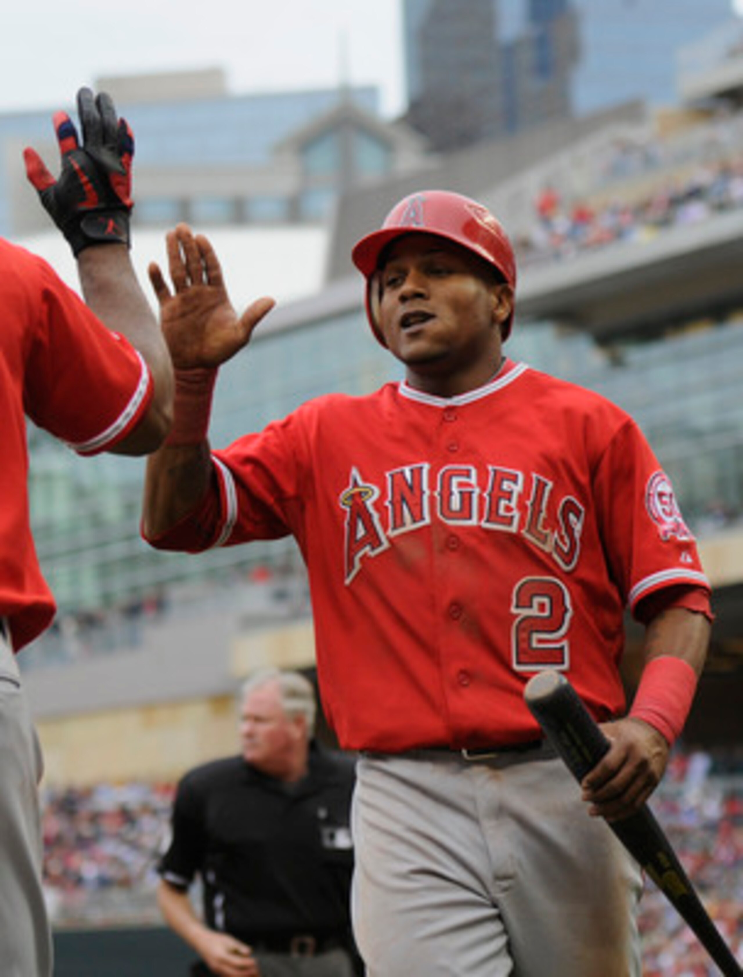 MINNEAPOLIS, MN - MAY 29: Erick Aybar #2 of the Los Angeles Angels of Anaheim celebrates scoring against the Minnesota Twins during the eighth inning of their game on May 29, 2011 at Target Field in Minneapolis, Minnesota. Angels defeated the Twins 6-5. (