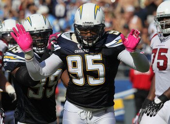 SAN DIEGO - OCTOBER 03:  Linebackers Shaun Phillips #95 and Kevin Burnett #99 of the San Diego Chargers celebrate a Phillips sack against the Arizona Cardinals at Qualcomm Stadium on October 3, 2010 in San Diego, California.   The Chargers won 41-10.  (Ph