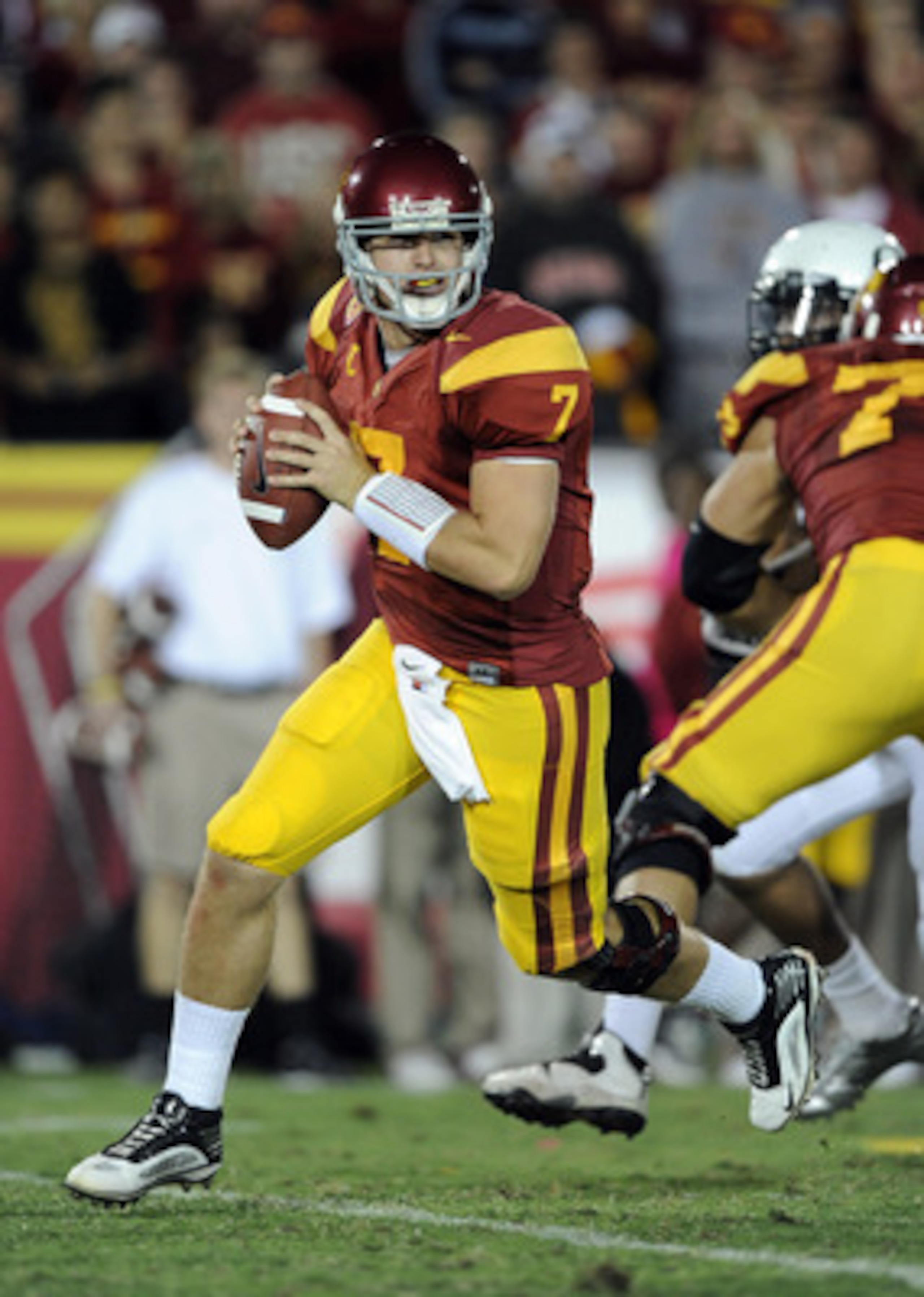 LOS ANGELES, CA - OCTOBER 30:  Matt Barkley #7 of the USC Trojans rolls out of the pocket against the Oregon Ducks at Los Angeles Memorial Coliseum on October 30, 2010 in Los Angeles, California.  (Photo by Harry How/Getty Images)