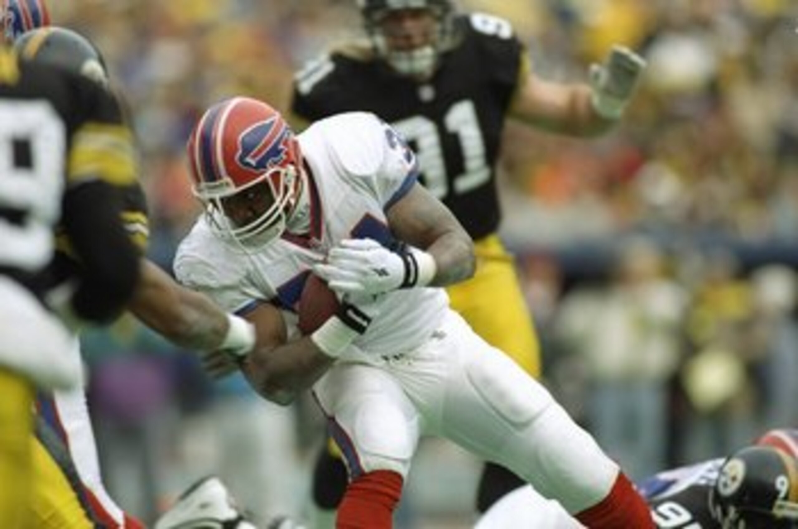 6 Jan 1996: Running back Thurman Thomas of the Buffalo Bills scores a touchdown during a playoff game against the Pittsburgh Steelers at Three Rivers Stadium in Pittsburgh, Pennsylvania. The Steelers won the game, 40-21.